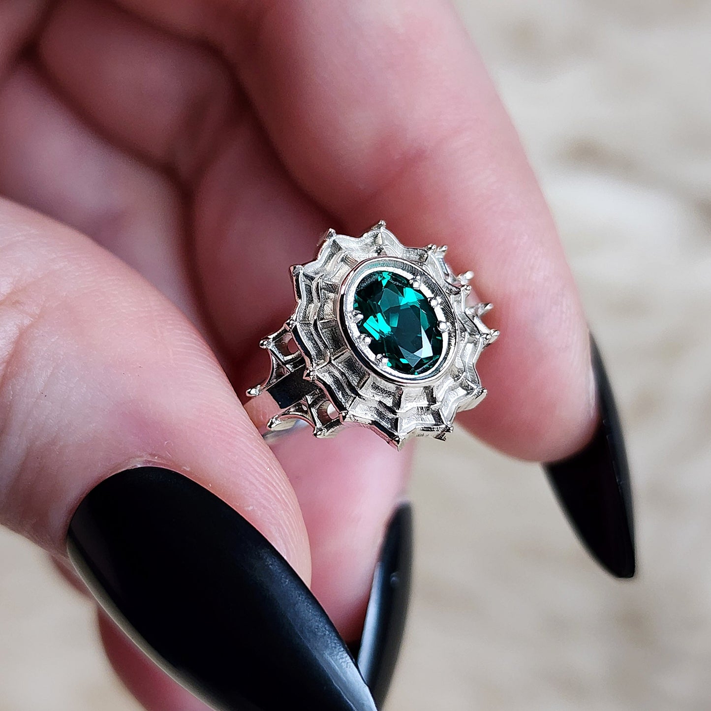oval emerald morticia engagement ring spider web gothic victorian