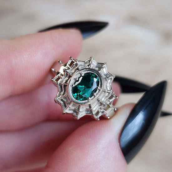 oval emerald morticia engagement ring spider web gothic victorian