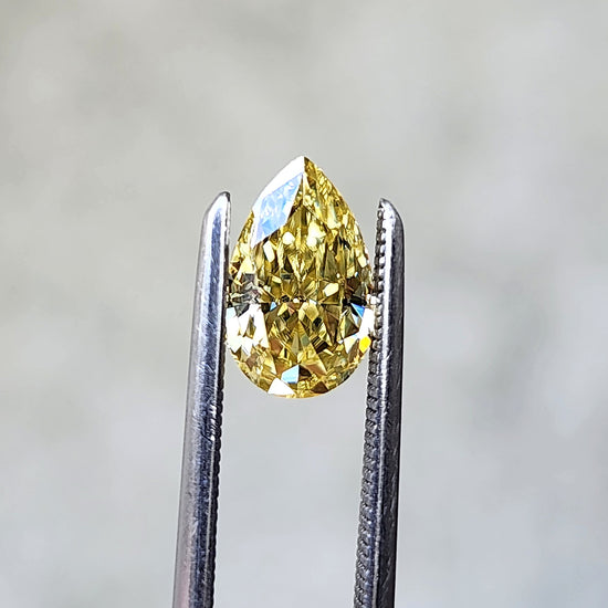 .93ct 8x5mm Yellow Moissanite Pear