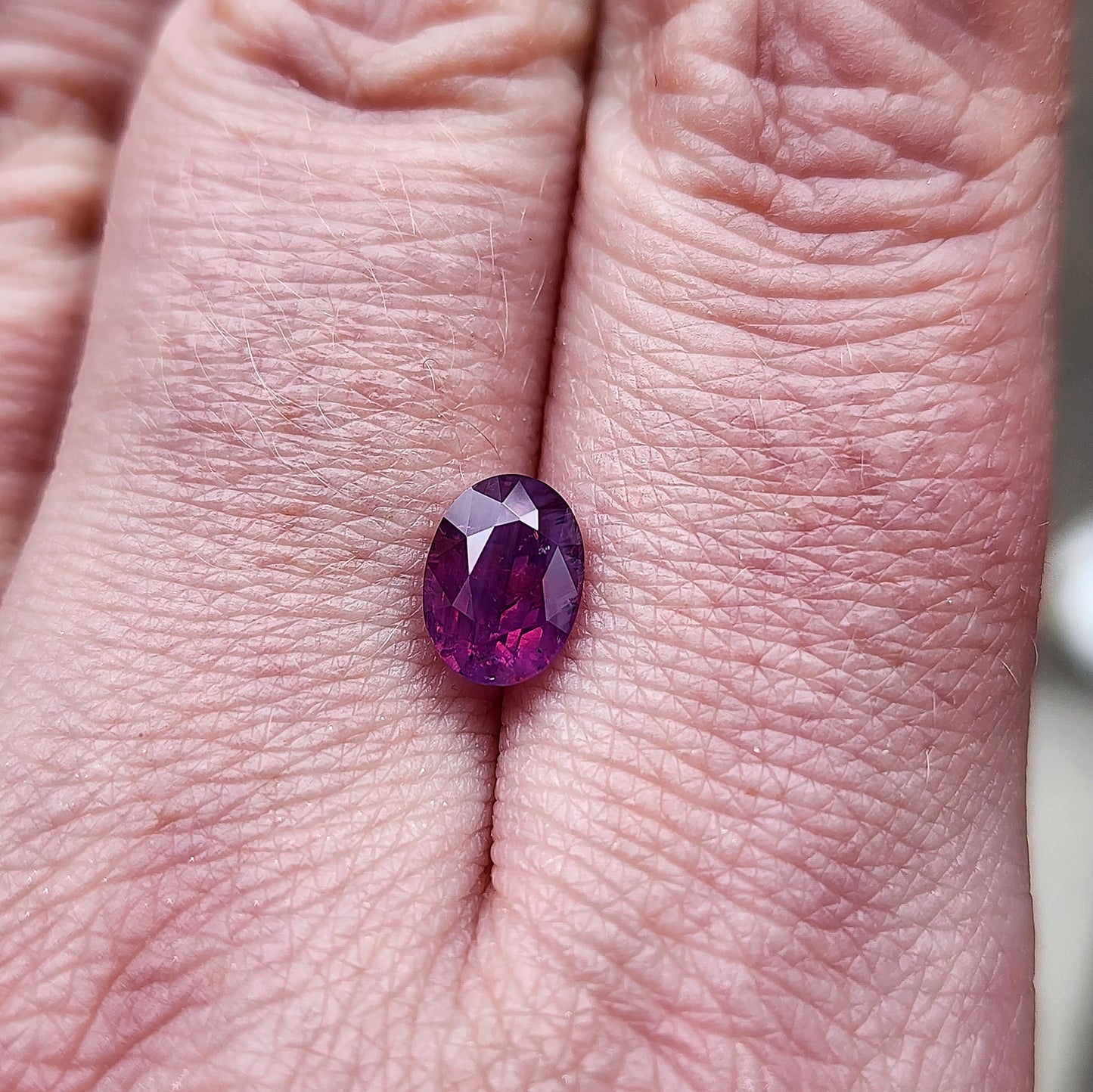 1.64 Natural Opalescent Purple Pink Oval Sapphire