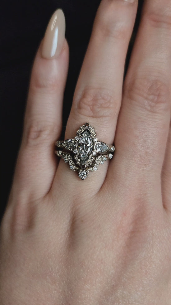 Load and play video in Gallery viewer, Odette Marquise Engagement Ring Set with Fancy Gold Scrolls - Feminine Ethereal Fine Handcrafted Wedding Ring Set
