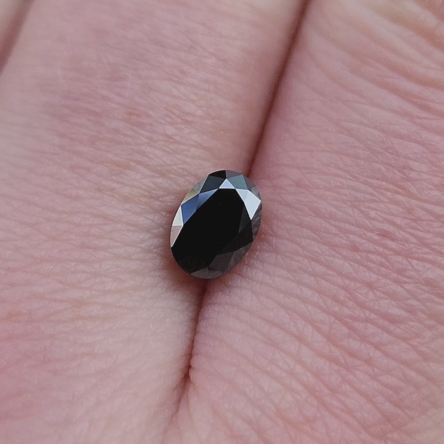 Load and play video in Gallery viewer, .95ct Oval Black Moissanite
