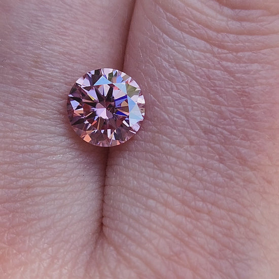 Load and play video in Gallery viewer, 1.50ct Round Pink Moissanite 7.55mm
