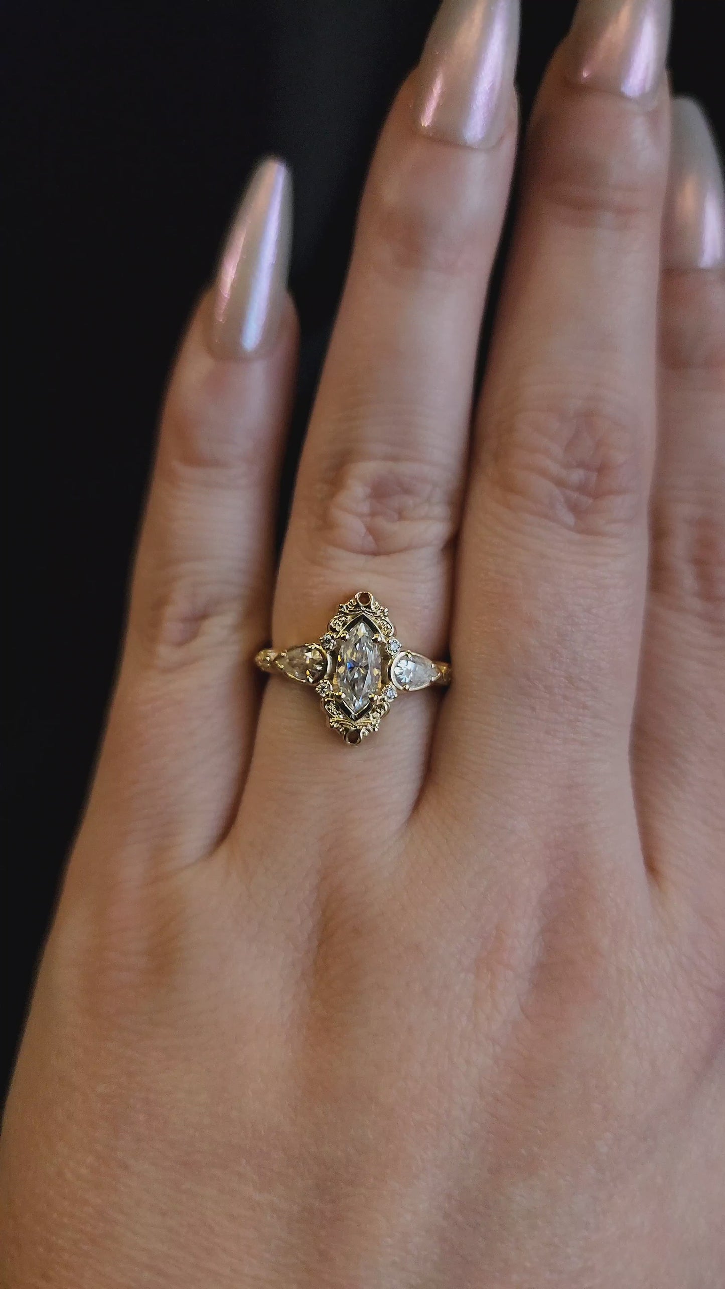 Load and play video in Gallery viewer, Odette Marquise Engagement Ring with Pear Side Stones and Gold Scrollwork - Fantasy Filigree 14k Gold Handmade Ring

