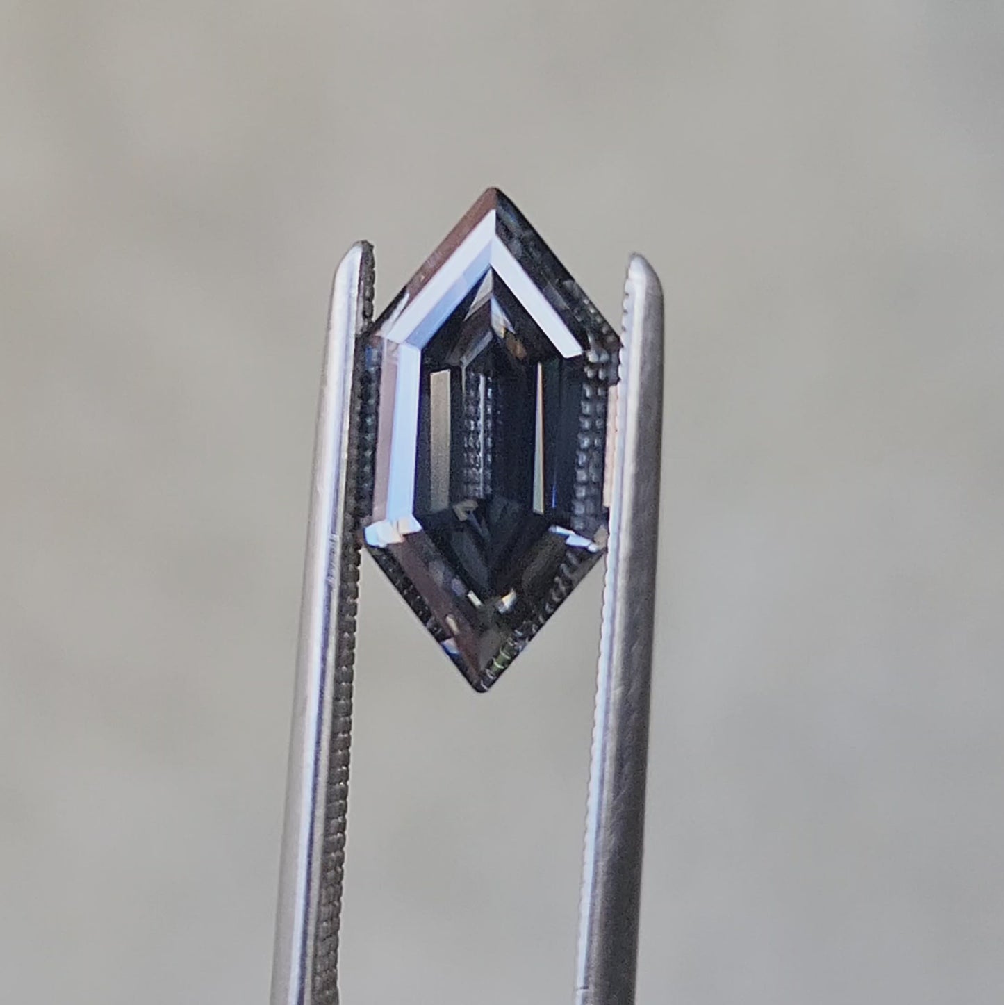 Load and play video in Gallery viewer, 1.89ct Step Cut Gray Moissanite Elongated Hexagon
