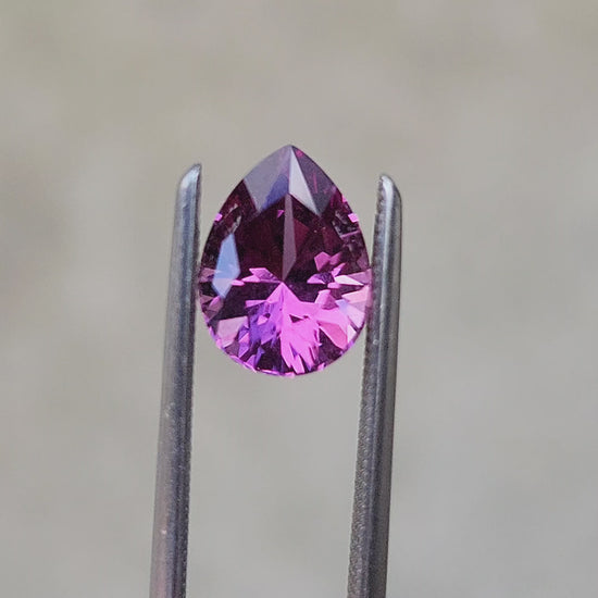 Load and play video in Gallery viewer, 1.76ct Natural Color Change Purple Pyrope Garnet Pear
