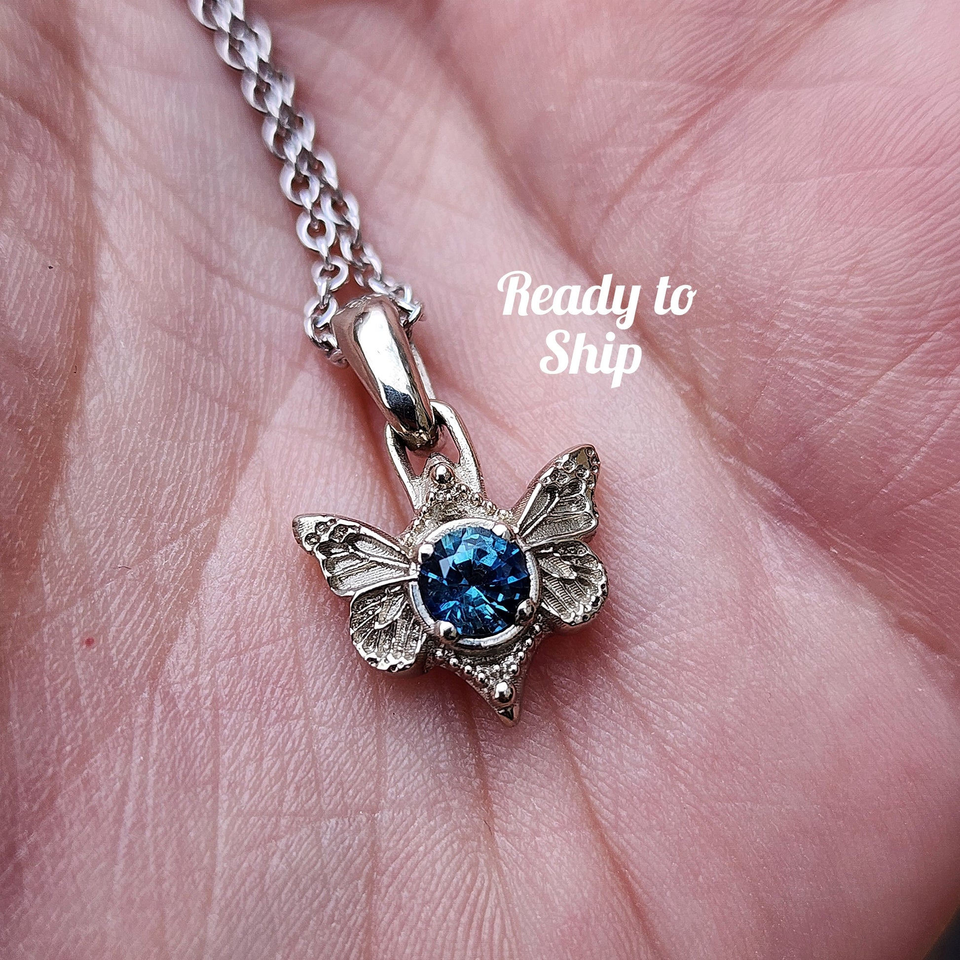 14k gold montana sapphire butterfly fairy pendant