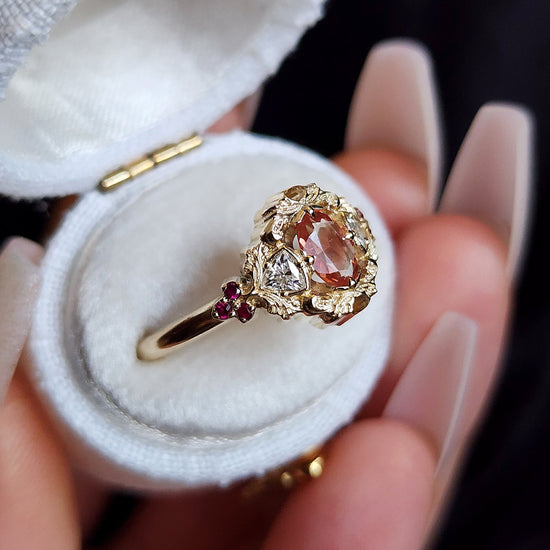 Ophelia Oregon sunstone and diamond trillion engagement ring with rubies antique details