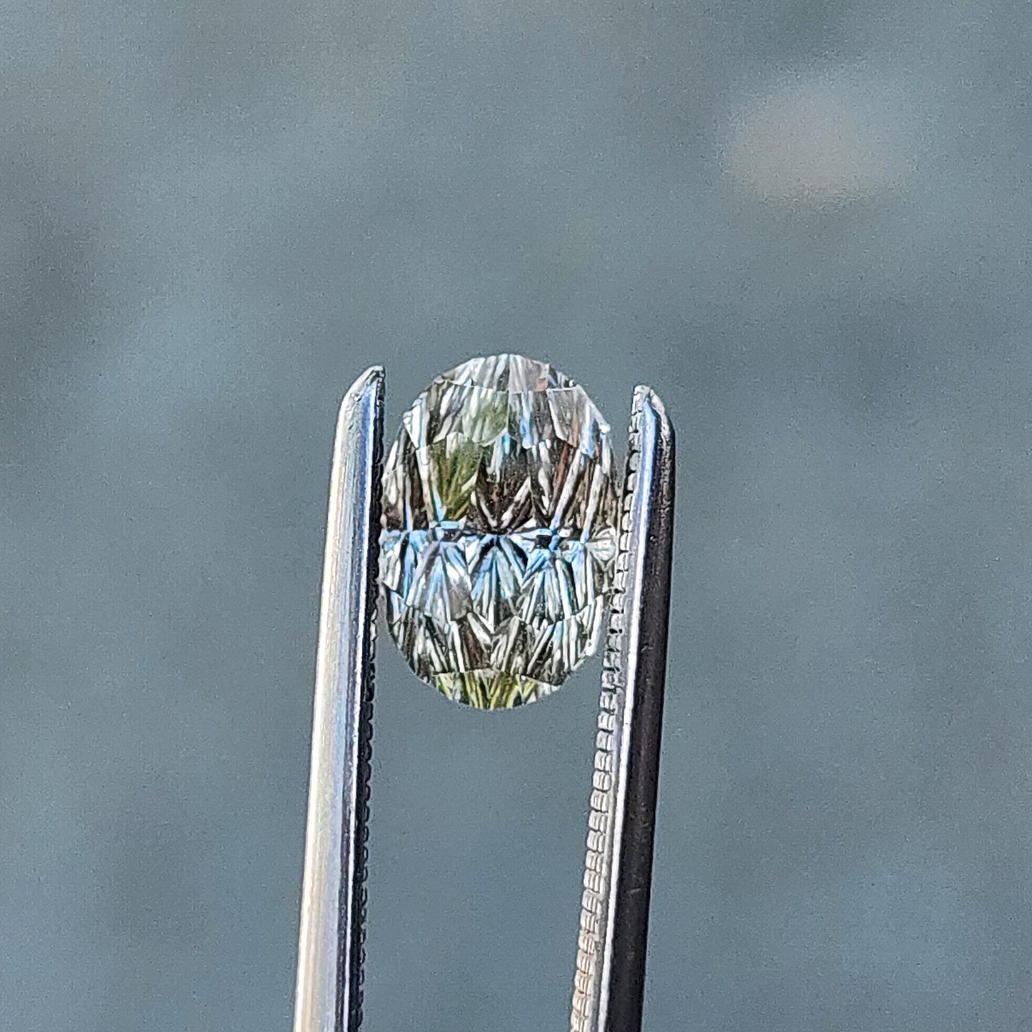 1.44ct Natural Yellow Green Montana Sapphire Oval - Deep Concave Cut by John Dyer