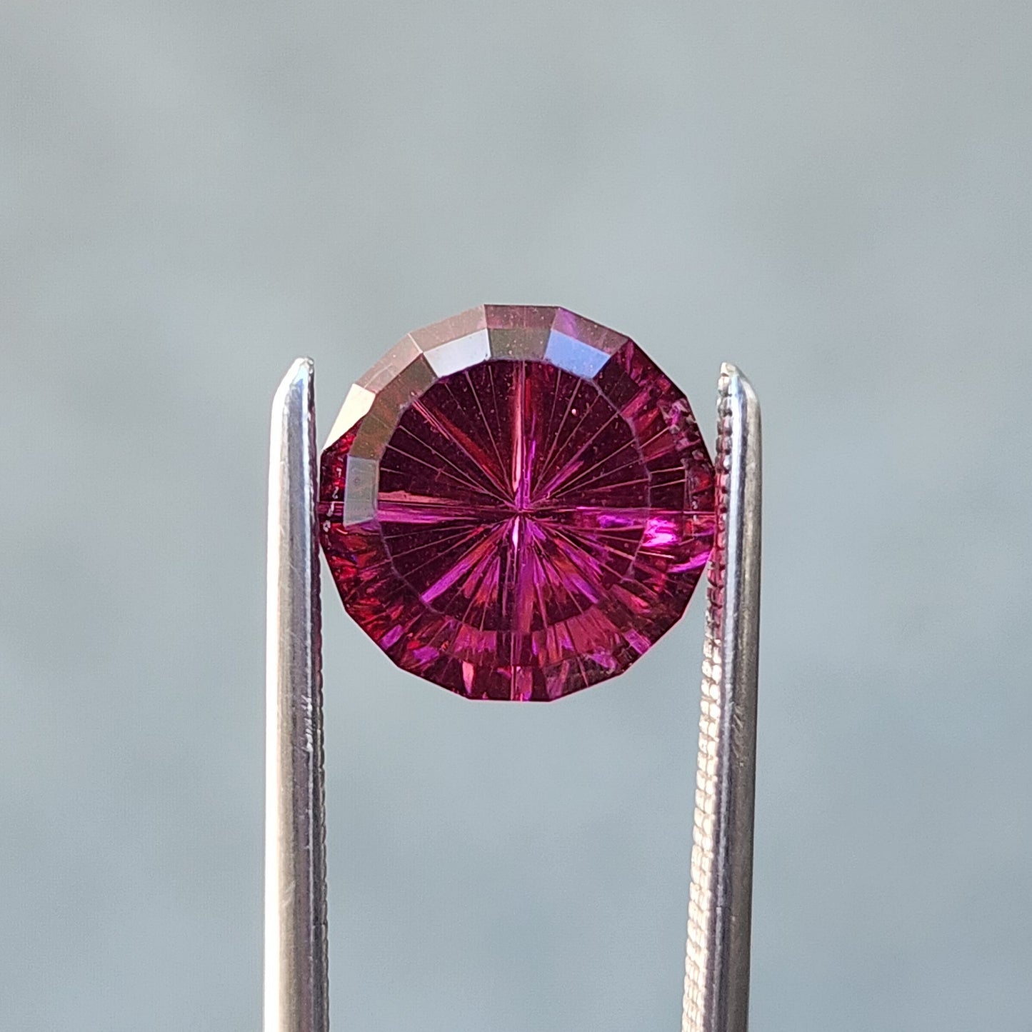 3.41ct Natural Round Rhodolite Garnet  - Starbrite cut by John Dyer