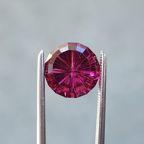 3.41ct Natural Round Rhodolite Garnet  - Starbrite cut by John Dyer
