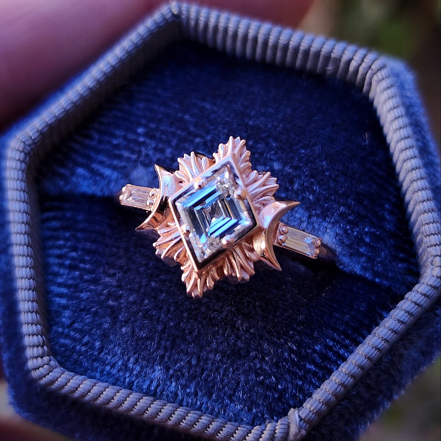 Rose gold galactic moon fire ring with a kite diamond in a blue velvet box image 1