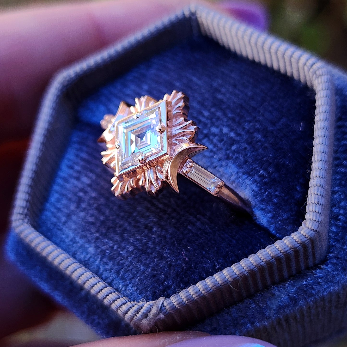 Rose gold galactic moon fire ring with a kite diamond in a blue velvet box image 3