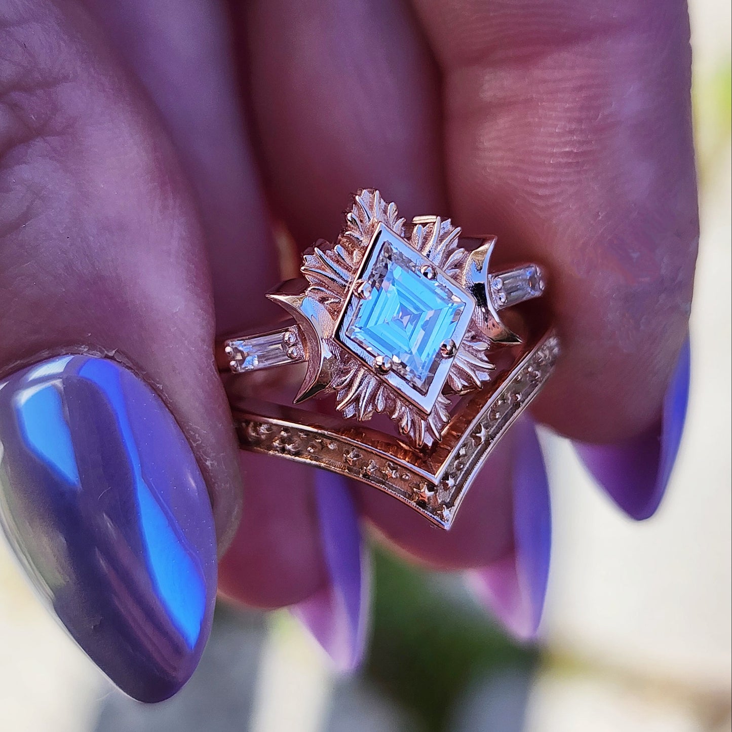 Rose gold galactic moon fire ring with a kite diamond in a blue velvet box image  12