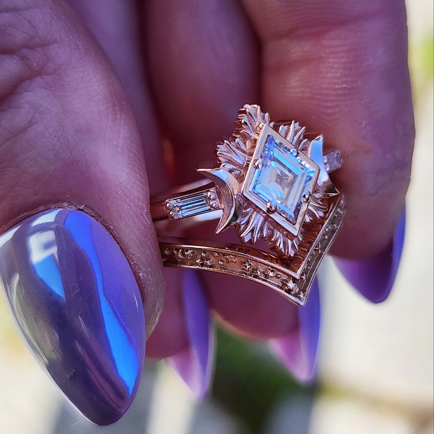 Rose gold galactic moon fire ring with a kite diamond in a blue velvet box image  13