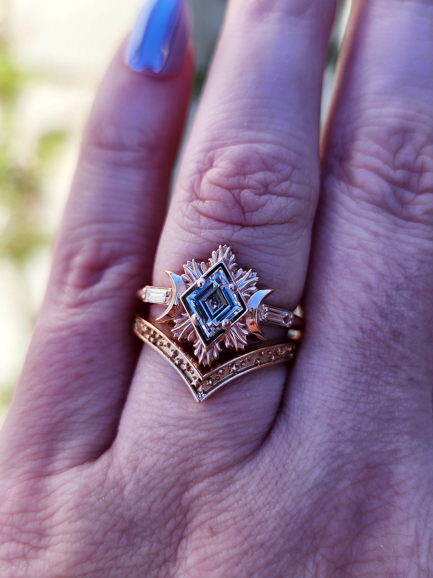 Rose gold galactic moon fire ring with a kite diamond in a blue velvet box image 8