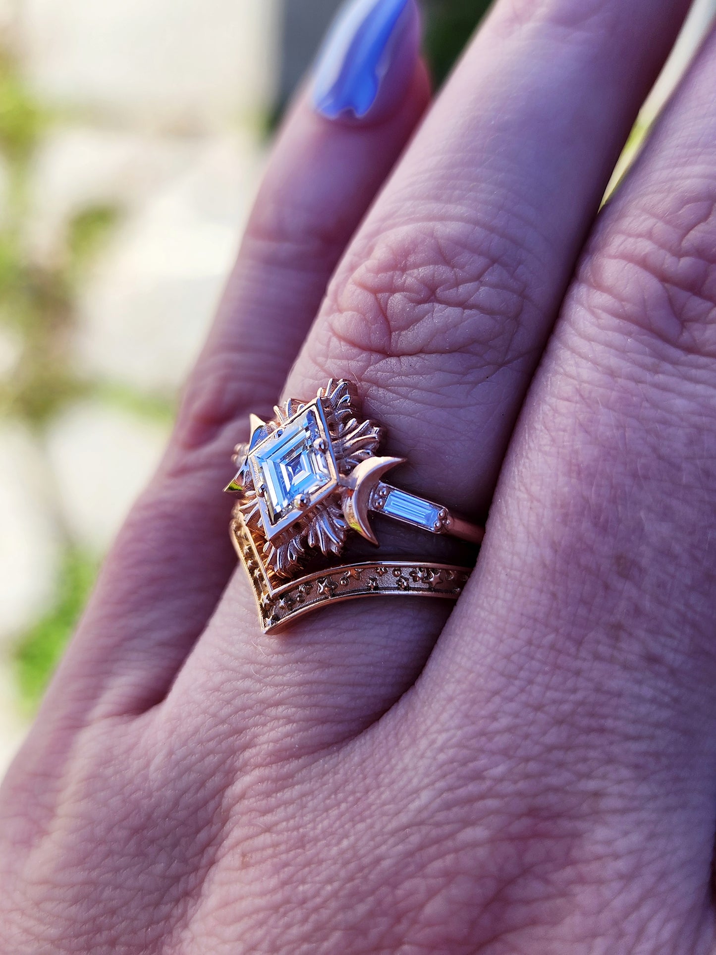 Rose gold galactic moon fire ring with a kite diamond in a blue velvet box image 9