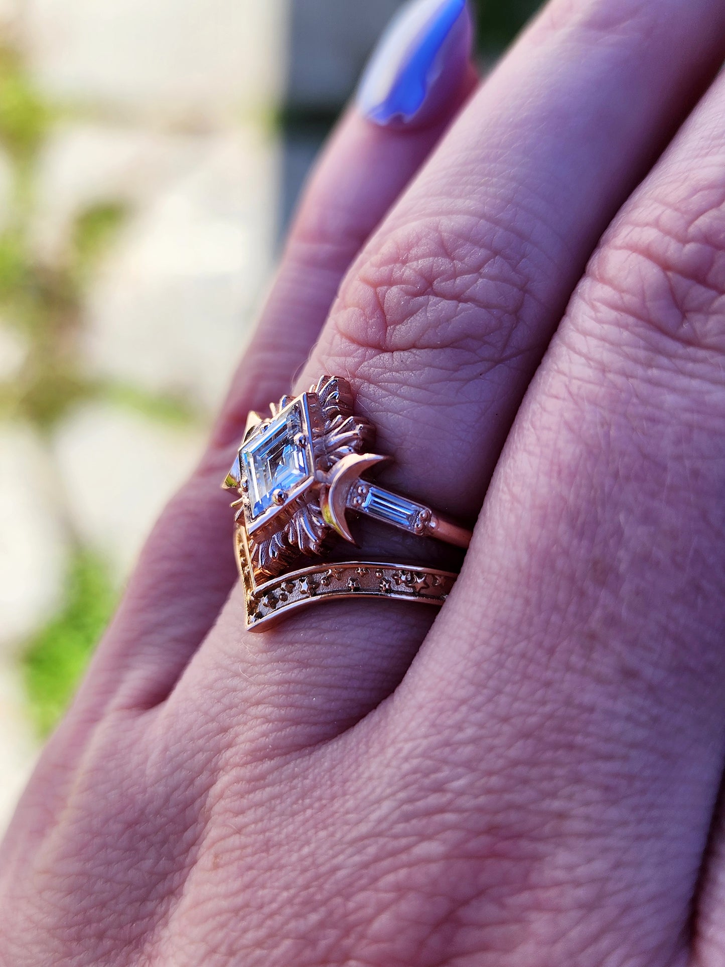 Rose gold galactic moon fire ring with a kite diamond in a blue velvet box image 10
