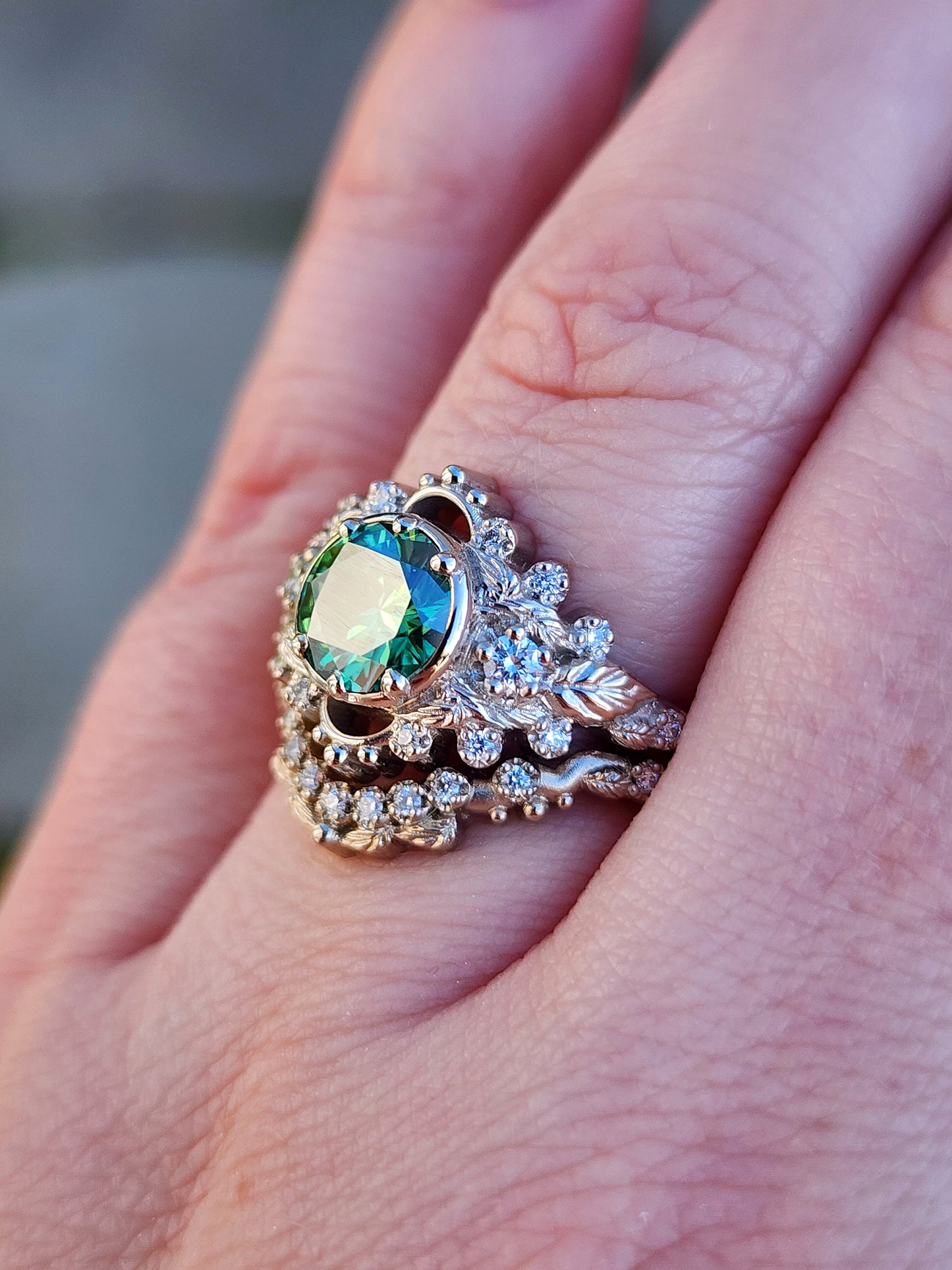 nature inspired leaf engagement ring set with green moissanite and diamonds 14k white gold image 10