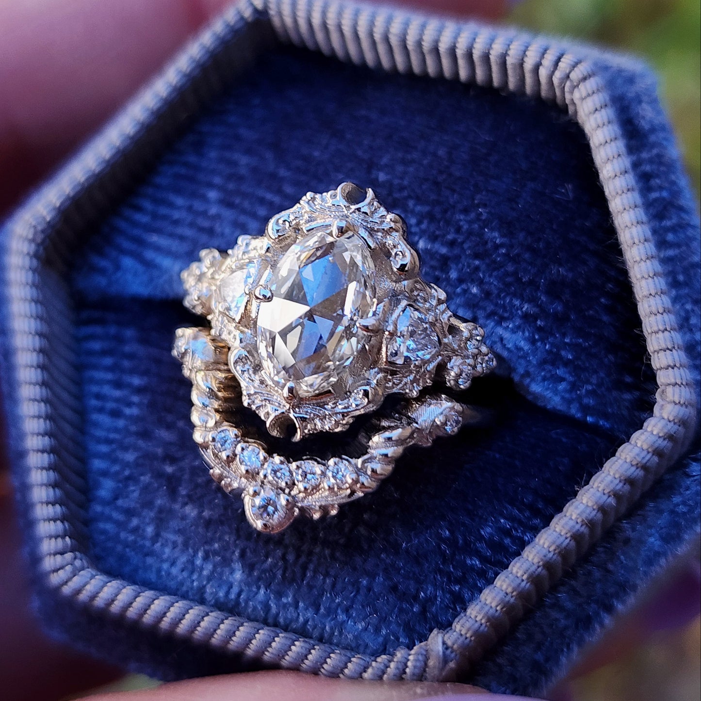 rose cut oval diamond antique victorian styled wedding ring set with trillions and scrolls in 14k white gold image 3