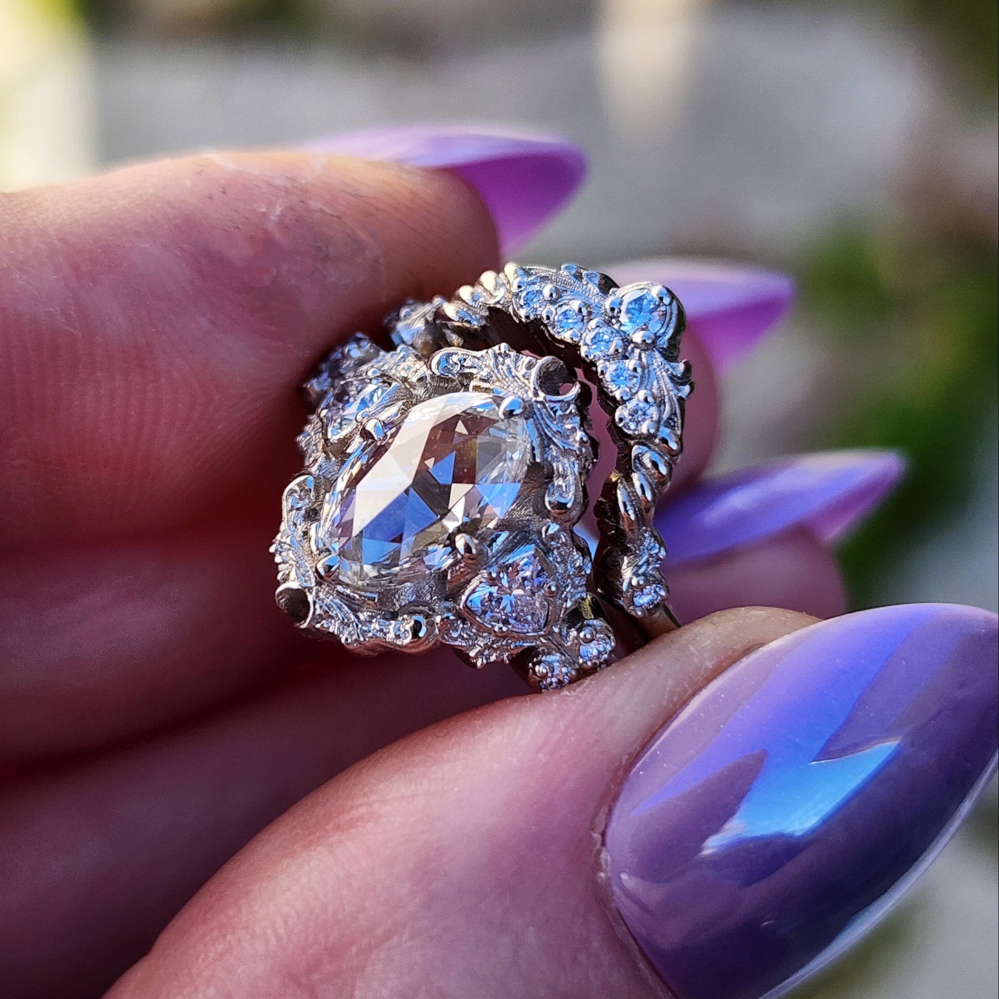 rose cut oval diamond antique victorian styled wedding ring set with trillions and scrolls in 14k white gold image 9