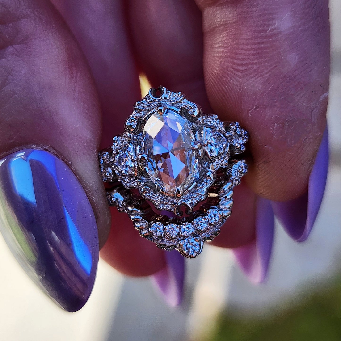 rose cut oval diamond antique victorian styled wedding ring set with trillions and scrolls in 14k white gold image 2