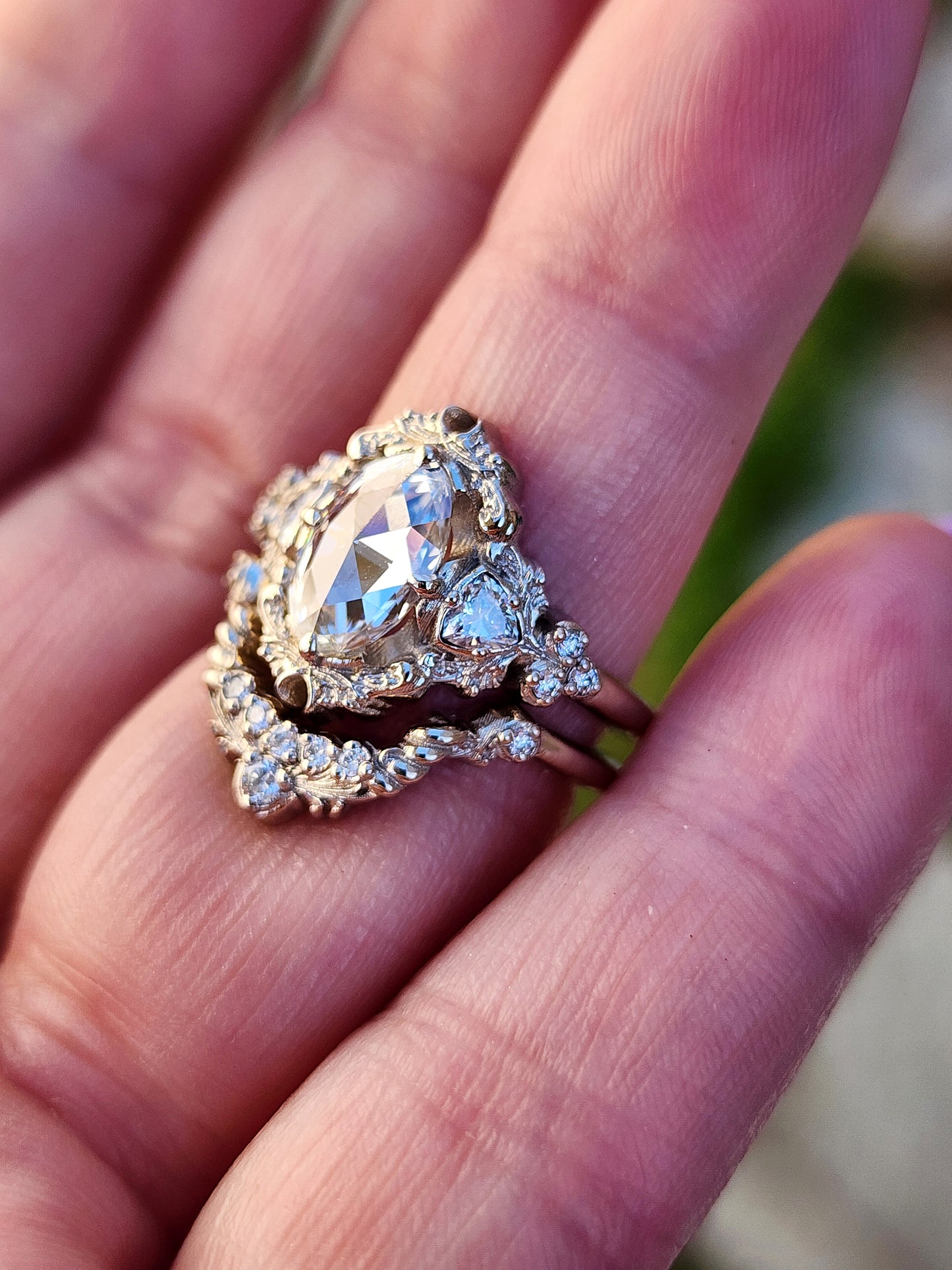 rose cut oval diamond antique victorian styled wedding ring set with trillions and scrolls in 14k white gold image 13