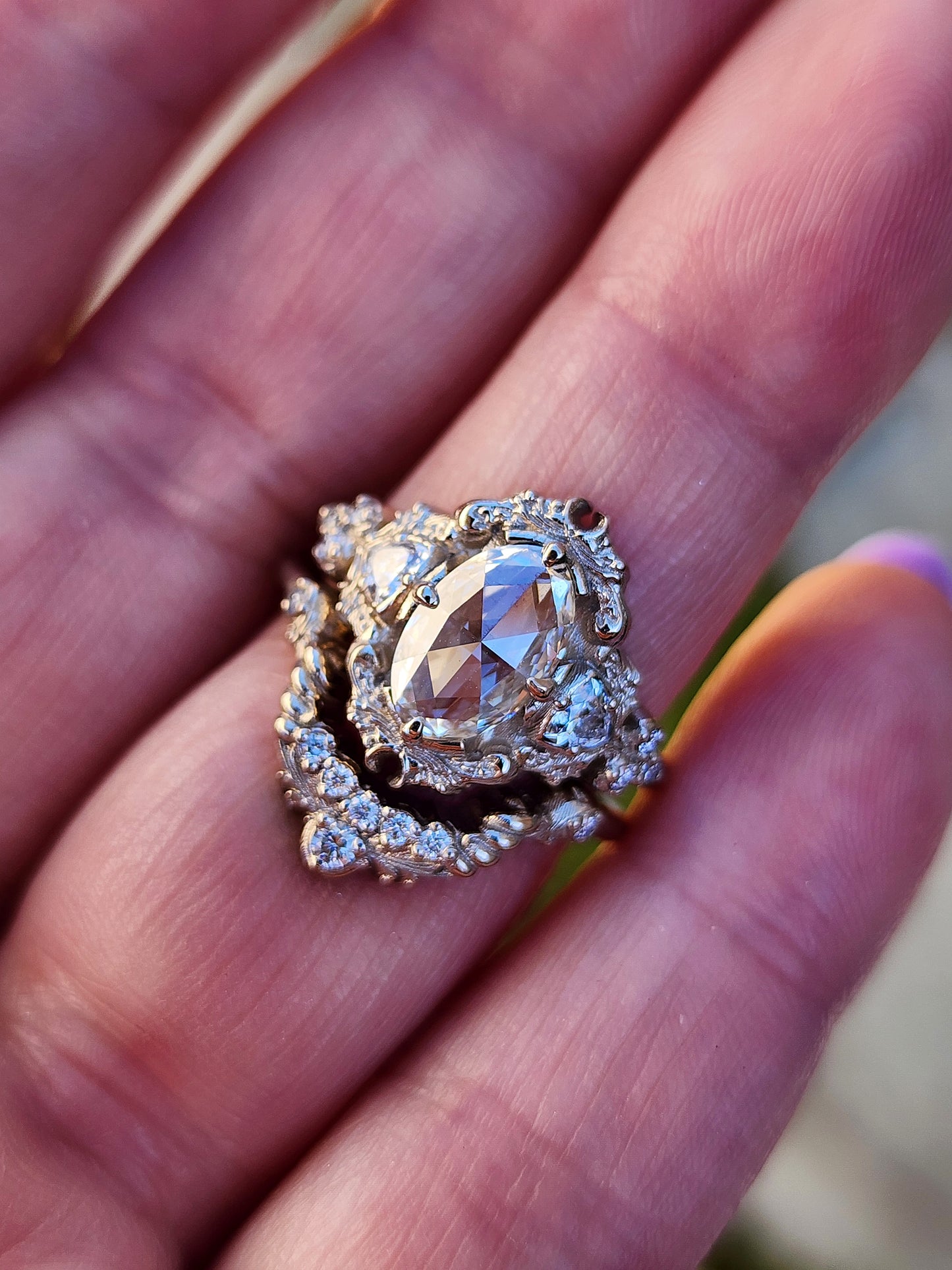 rose cut oval diamond antique victorian styled wedding ring set with trillions and scrolls in 14k white gold image 12