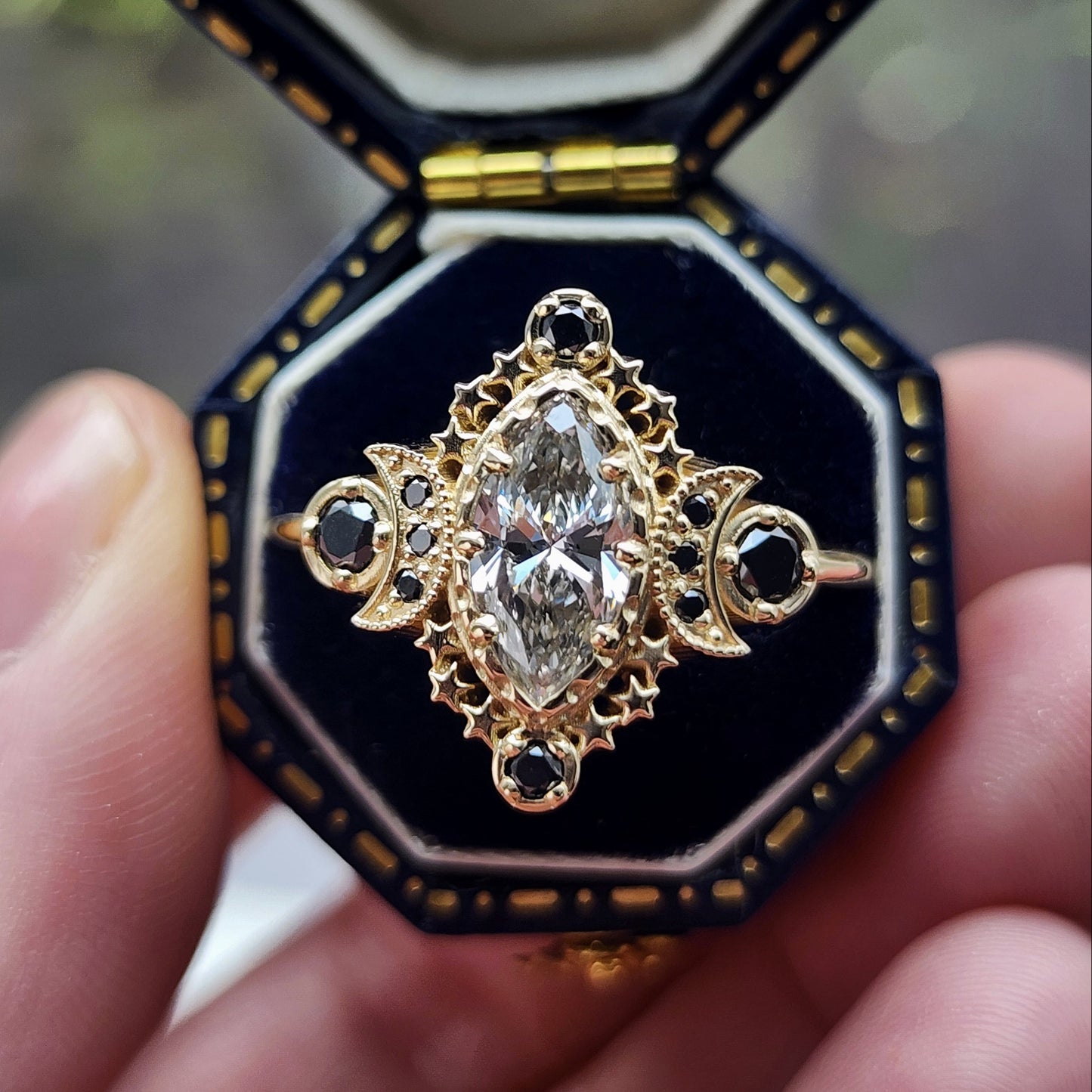 Cosmos Ring features a stunning 1.03ct Lab Marquise Diamond (with report) set in 14kt yellow gold The center stones is beautifully encircled by .40ct black diamonds image 1