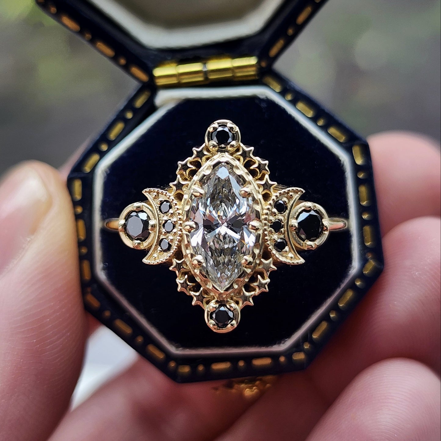 Cosmos Ring features a stunning 1.03ct Lab Marquise Diamond (with report) set in 14kt yellow gold The center stones is beautifully encircled by .40ct black diamonds image 2