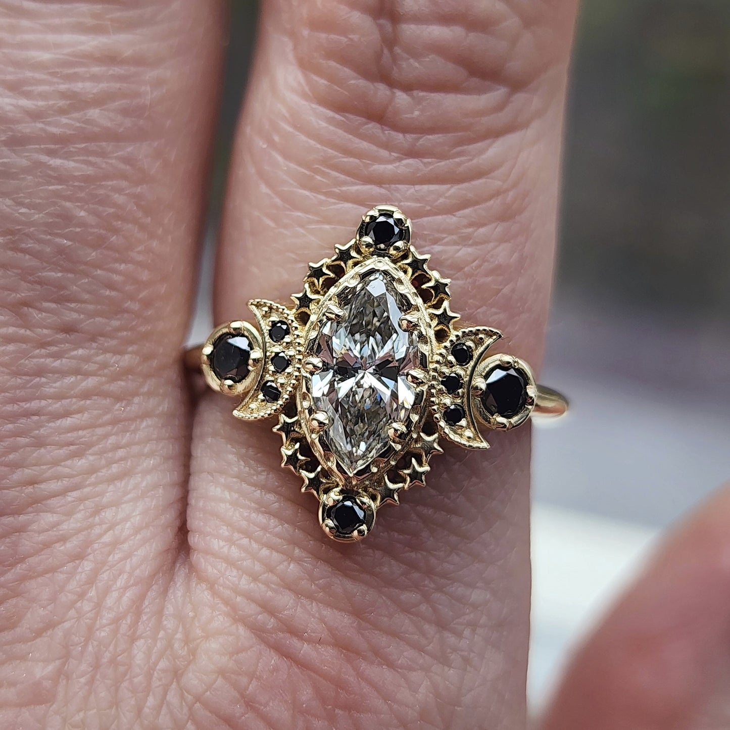 Cosmos Ring features a stunning 1.03ct Lab Marquise Diamond (with report) set in 14kt yellow gold The center stones is beautifully encircled by .40ct black diamonds image 7