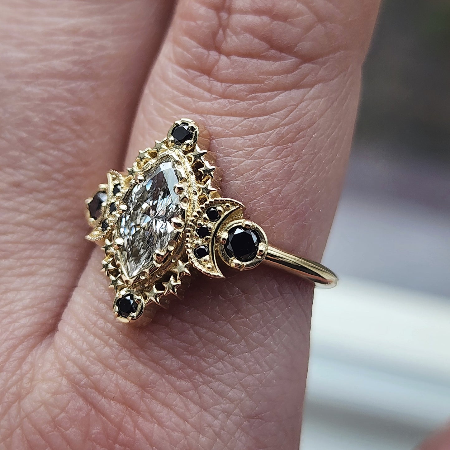 Cosmos Ring features a stunning 1.03ct Lab Marquise Diamond (with report) set in 14kt yellow gold The center stones is beautifully encircled by .40ct black diamonds image 9