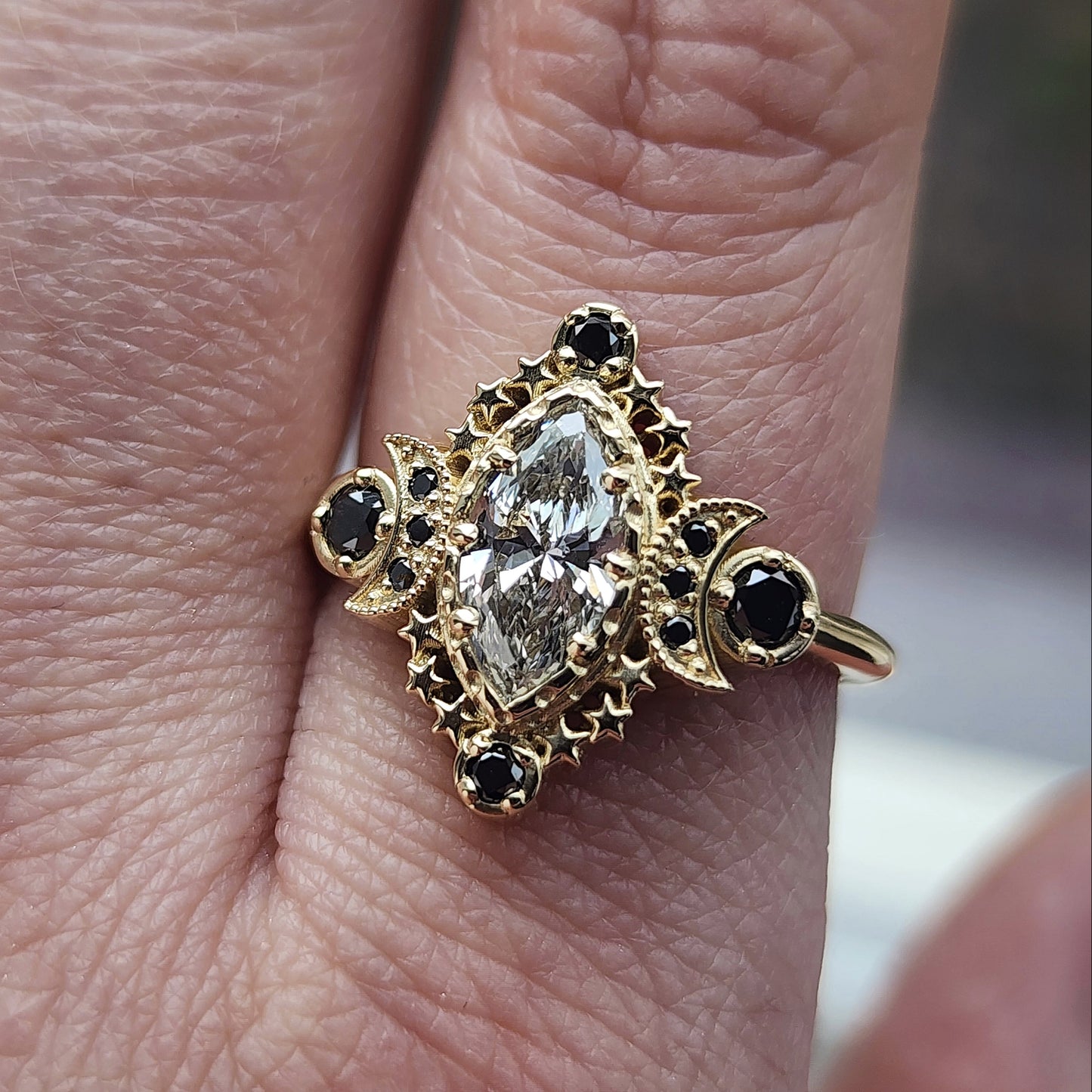 Cosmos Ring features a stunning 1.03ct Lab Marquise Diamond (with report) set in 14kt yellow gold The center stones is beautifully encircled by .40ct black diamonds image 8