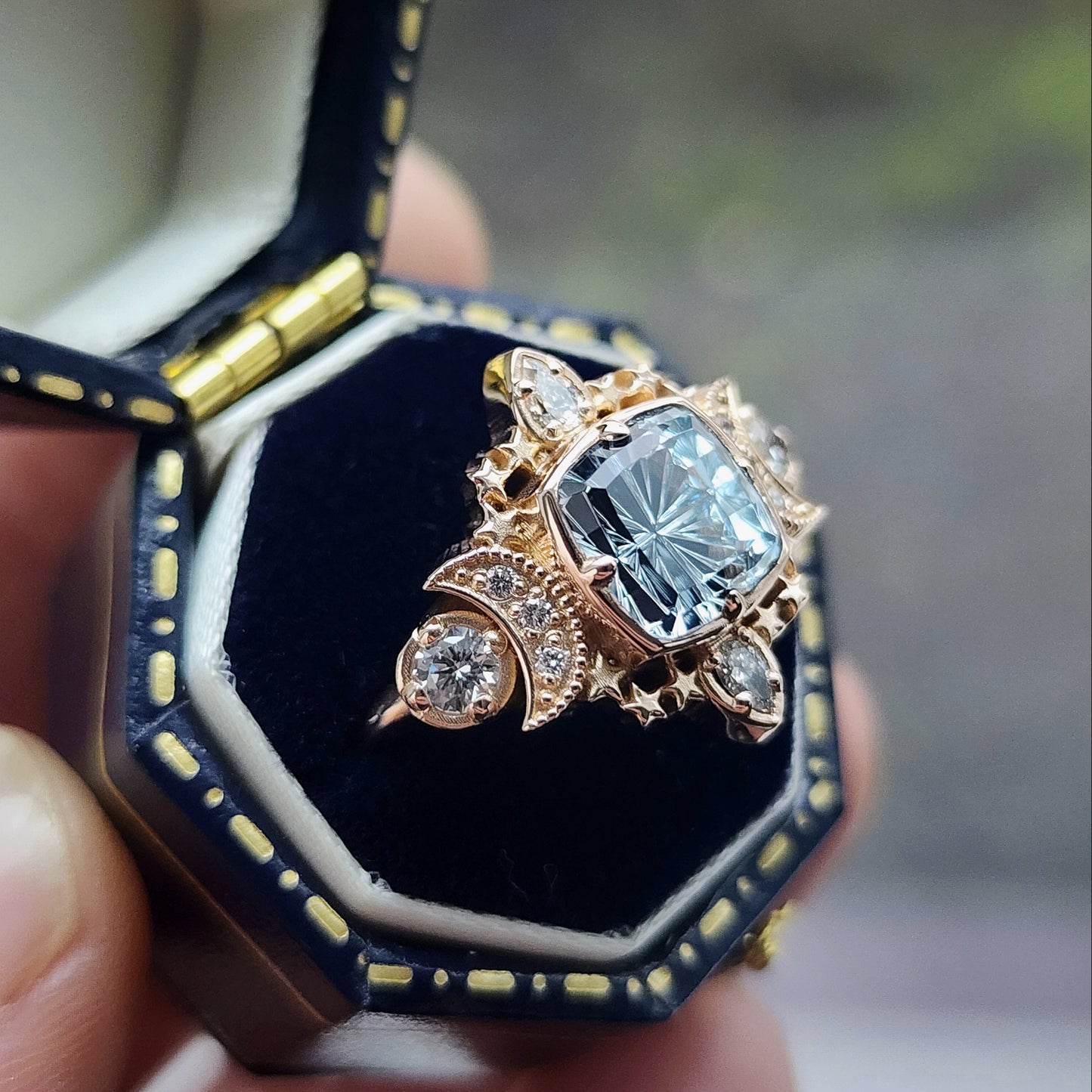  1.92ct Aquamarine Fantasy Cushion by John Dyer is the center stone of this Sparkling Cosmos Ring, set in 14kt rose gold Enhancing the magnificent aquamarine are .34ct VS lab diamonds, which beautifully encircle the stone image 3