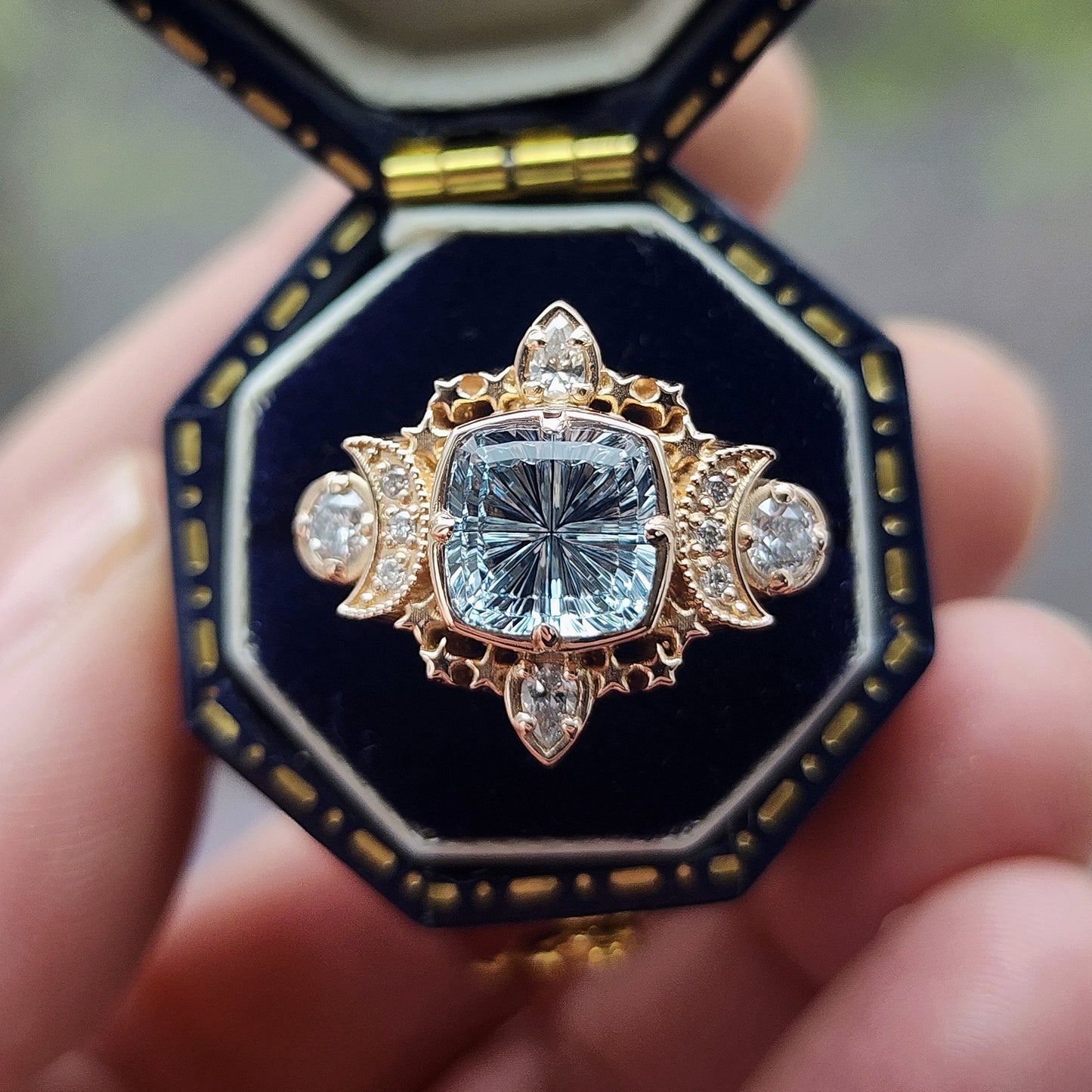  1.92ct Aquamarine Fantasy Cushion by John Dyer is the center stone of this Sparkling Cosmos Ring, set in 14kt rose gold Enhancing the magnificent aquamarine are .34ct VS lab diamonds, which beautifully encircle the stone image 1