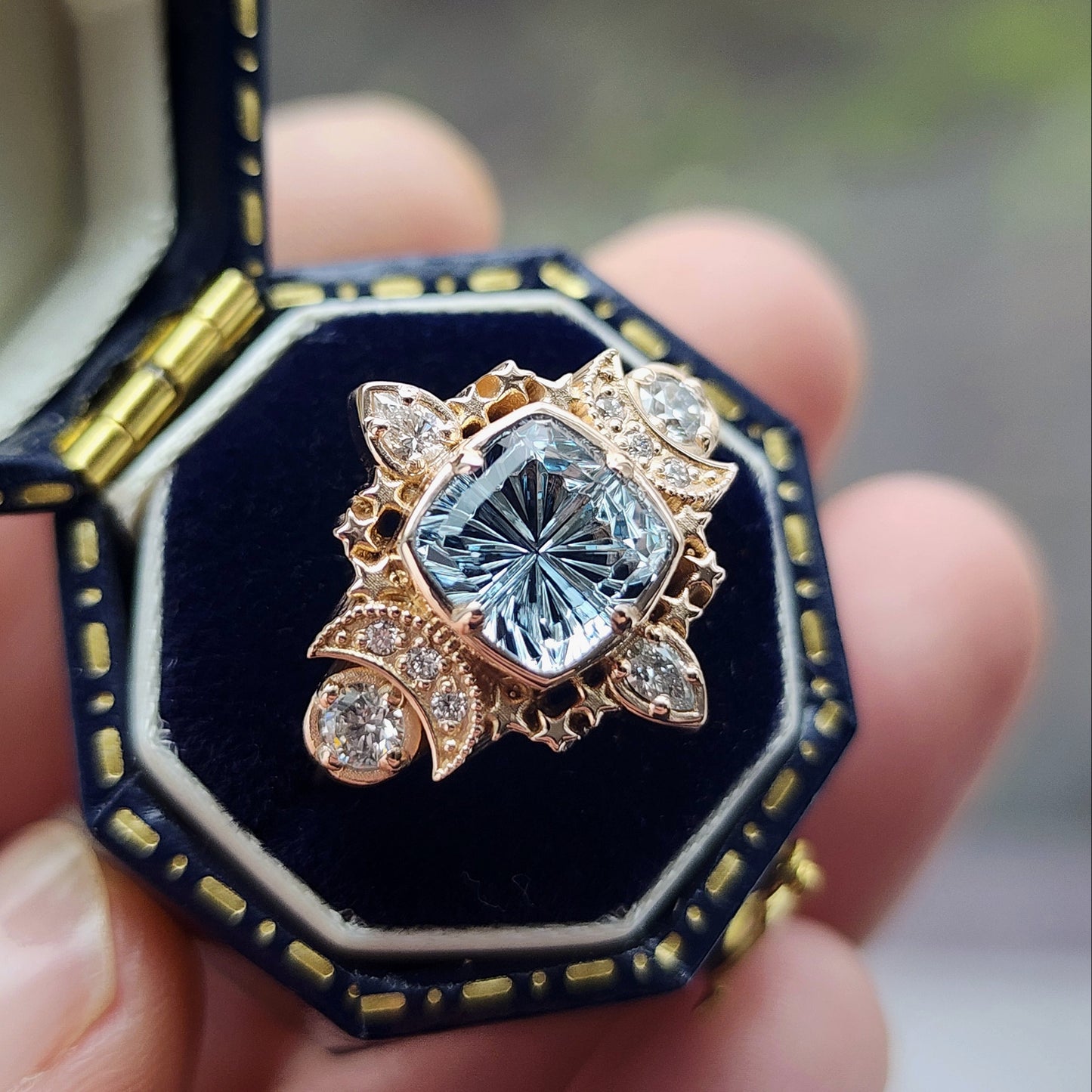  1.92ct Aquamarine Fantasy Cushion by John Dyer is the center stone of this Sparkling Cosmos Ring, set in 14kt rose gold Enhancing the magnificent aquamarine are .34ct VS lab diamonds, which beautifully encircle the stone image 5