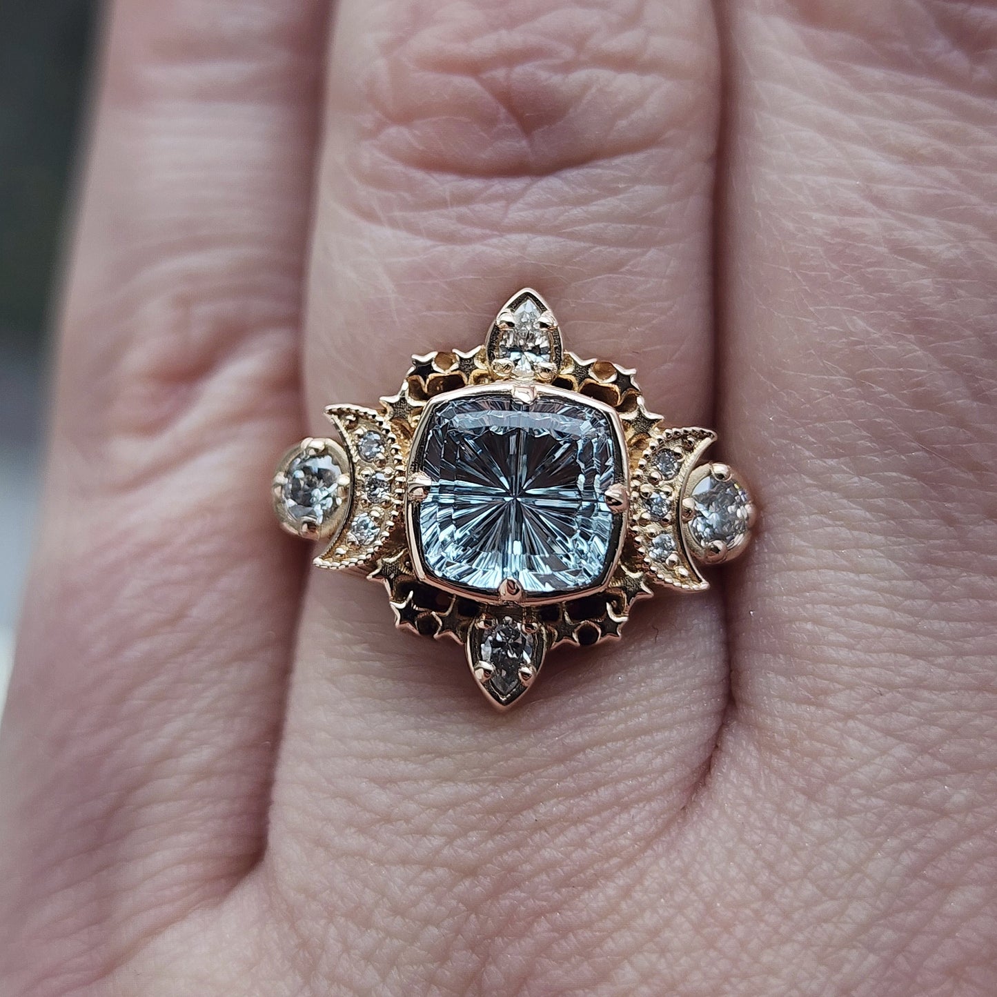  1.92ct Aquamarine Fantasy Cushion by John Dyer is the center stone of this Sparkling Cosmos Ring, set in 14kt rose gold Enhancing the magnificent aquamarine are .34ct VS lab diamonds, which beautifully encircle the stone image 8