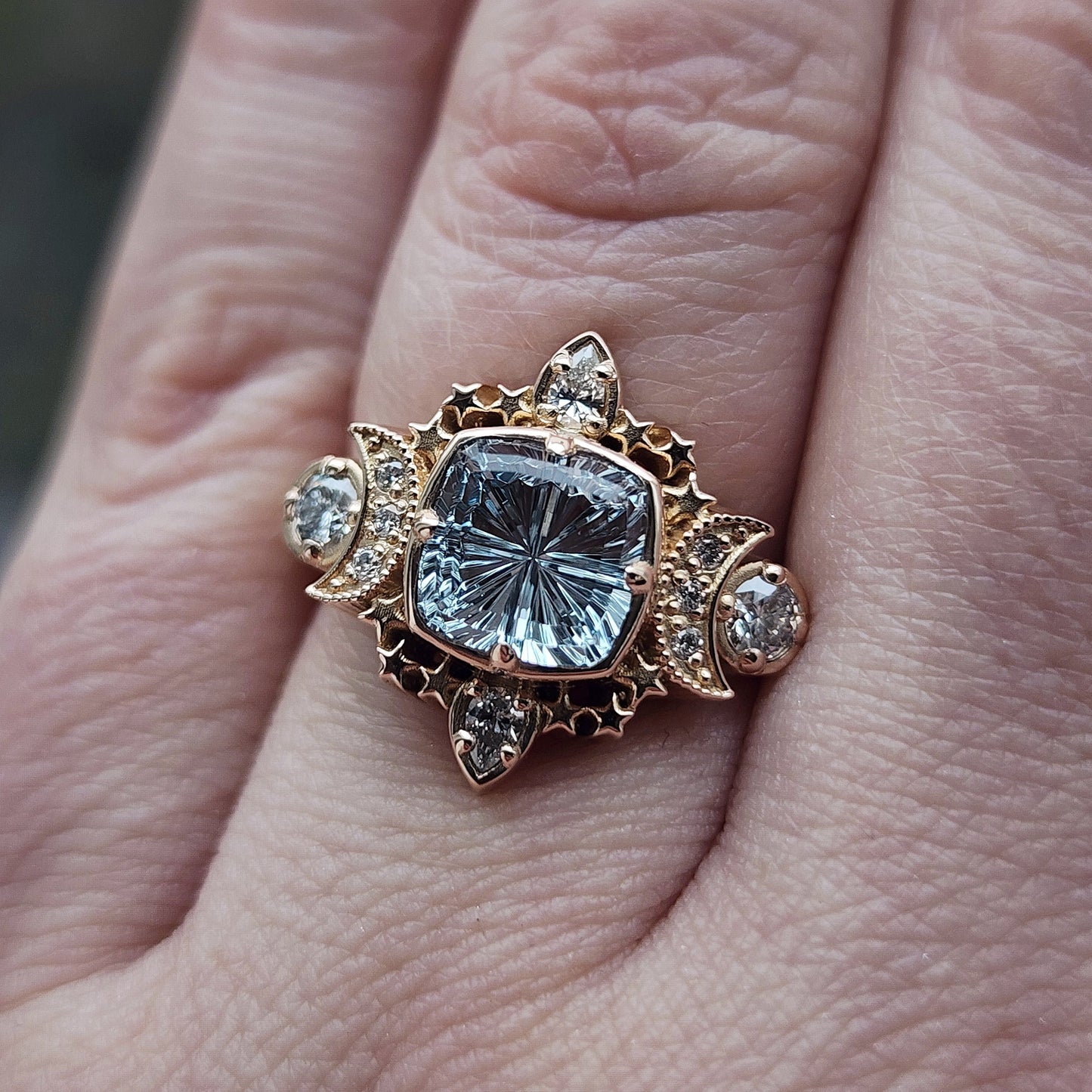  1.92ct Aquamarine Fantasy Cushion by John Dyer is the center stone of this Sparkling Cosmos Ring, set in 14kt rose gold Enhancing the magnificent aquamarine are .34ct VS lab diamonds, which beautifully encircle the stone image 11