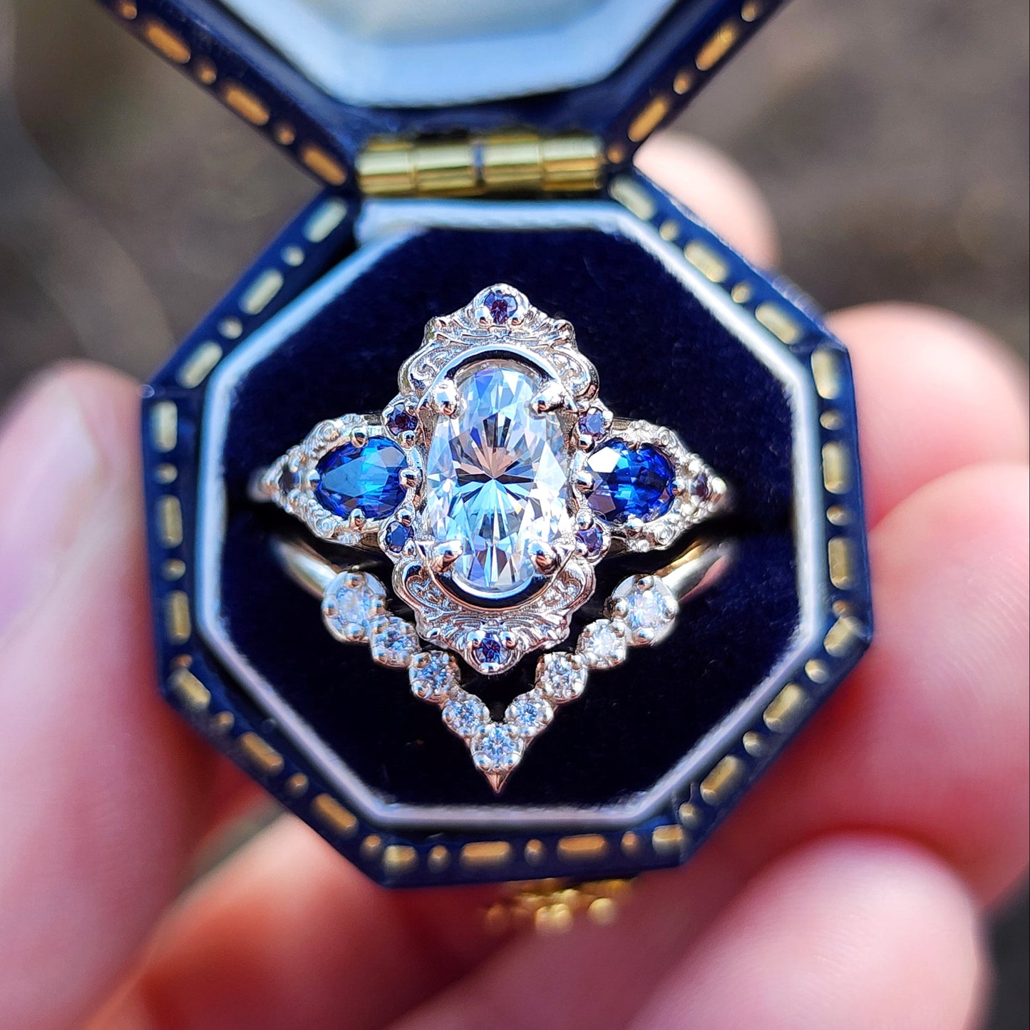 Josephine Set with a 1.10ct Elongated Oval Moissanite and Lab Blue Oval Sapphire Sides image 1