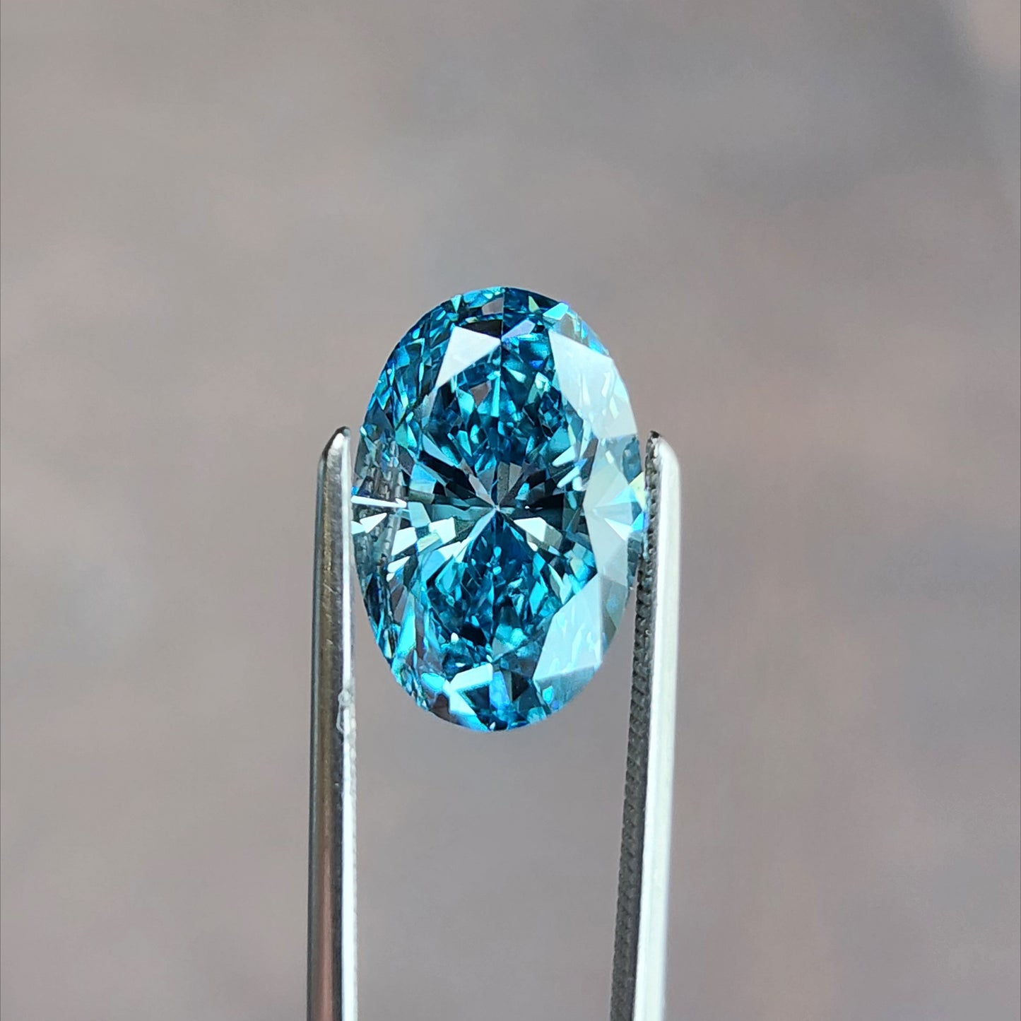 Fancy vivid blue lab diamond oval
