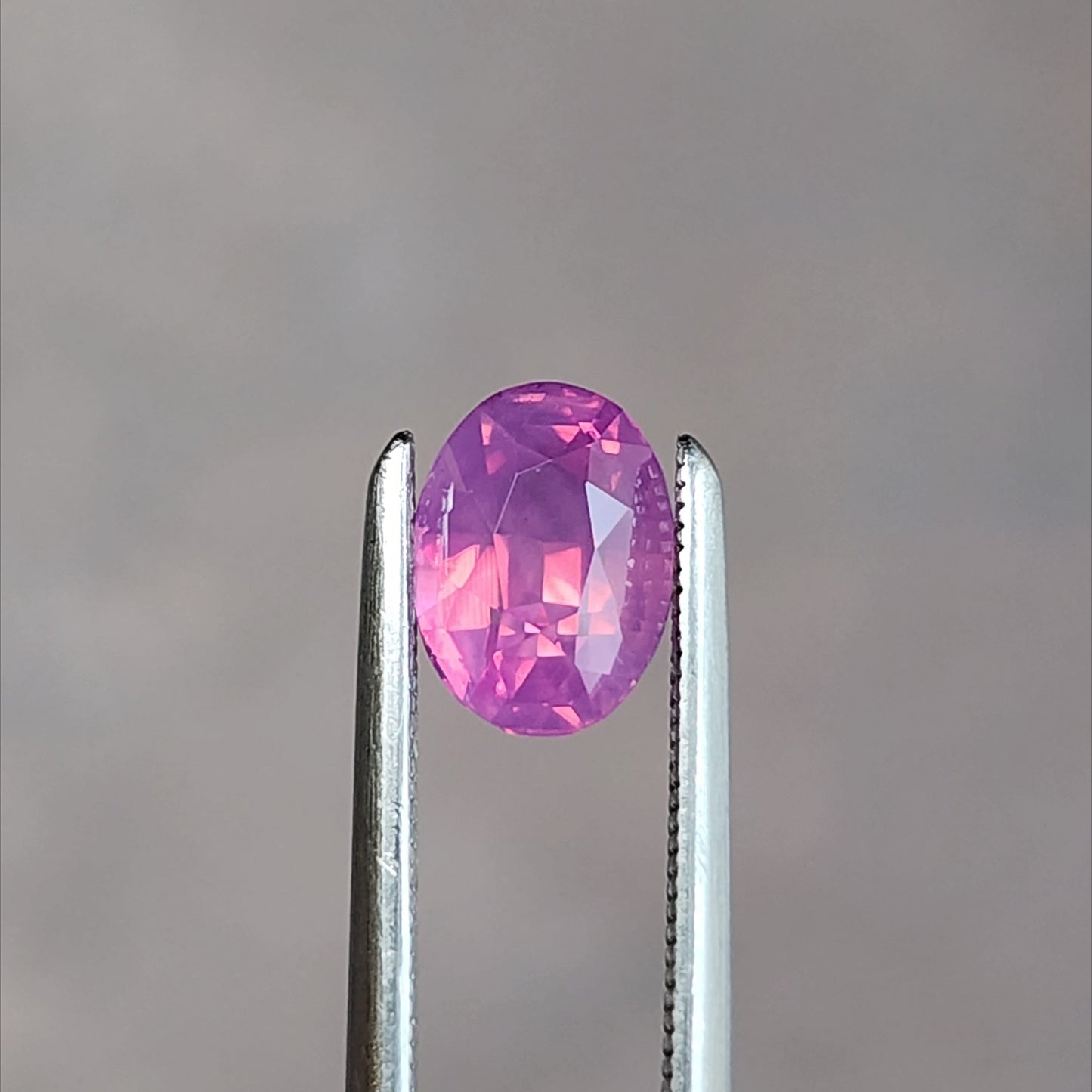 natural purple pink oval sapphire from Sri Lanka