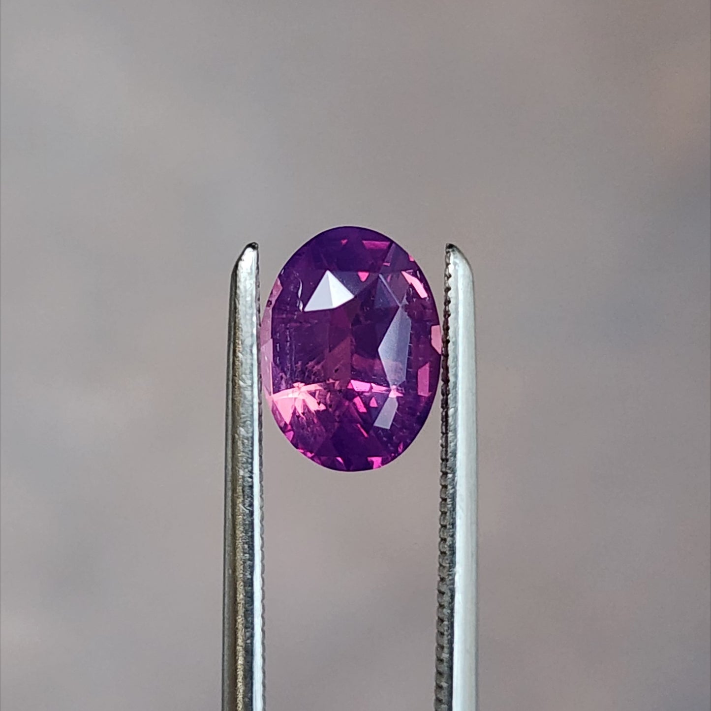 natural purple pink oval sapphire from Sri Lanka