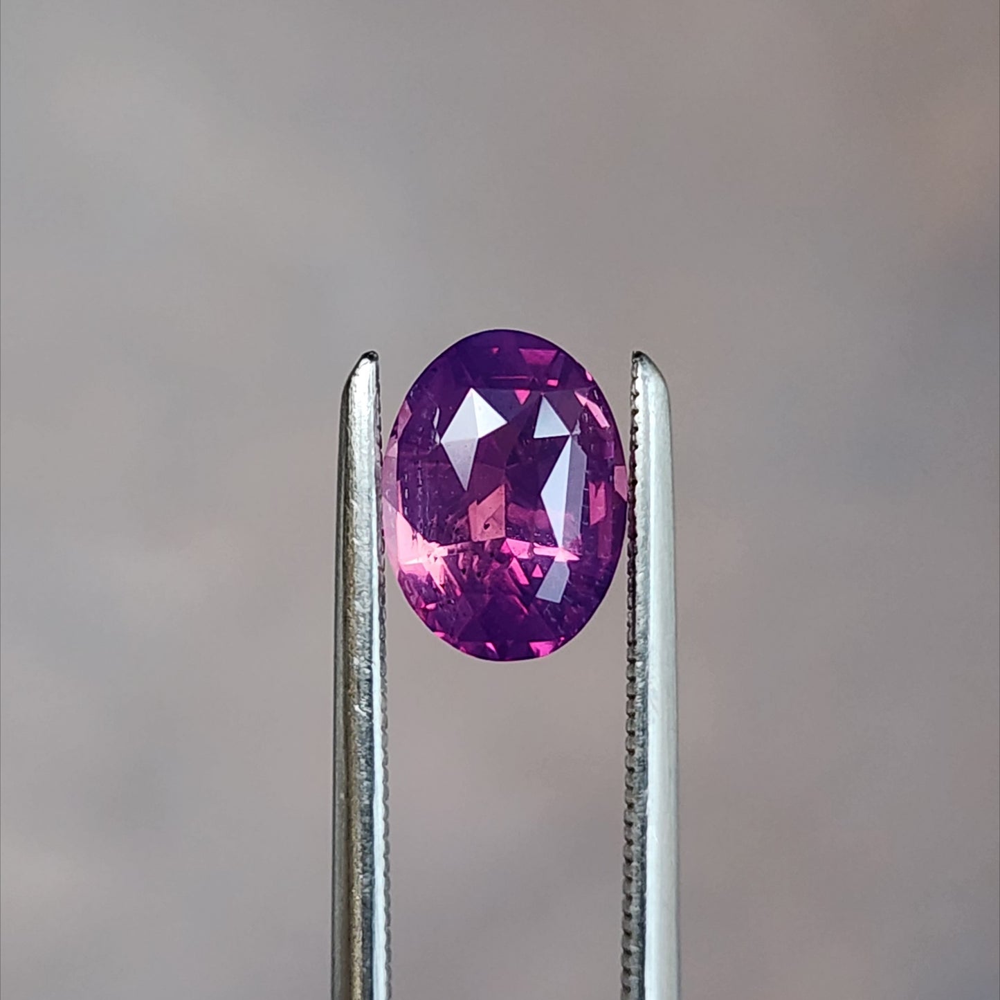 natural purple pink oval sapphire from Sri Lanka