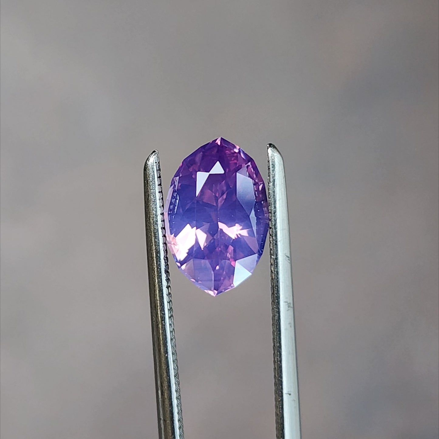 natural purple pink moval sapphire from Sri Lanka