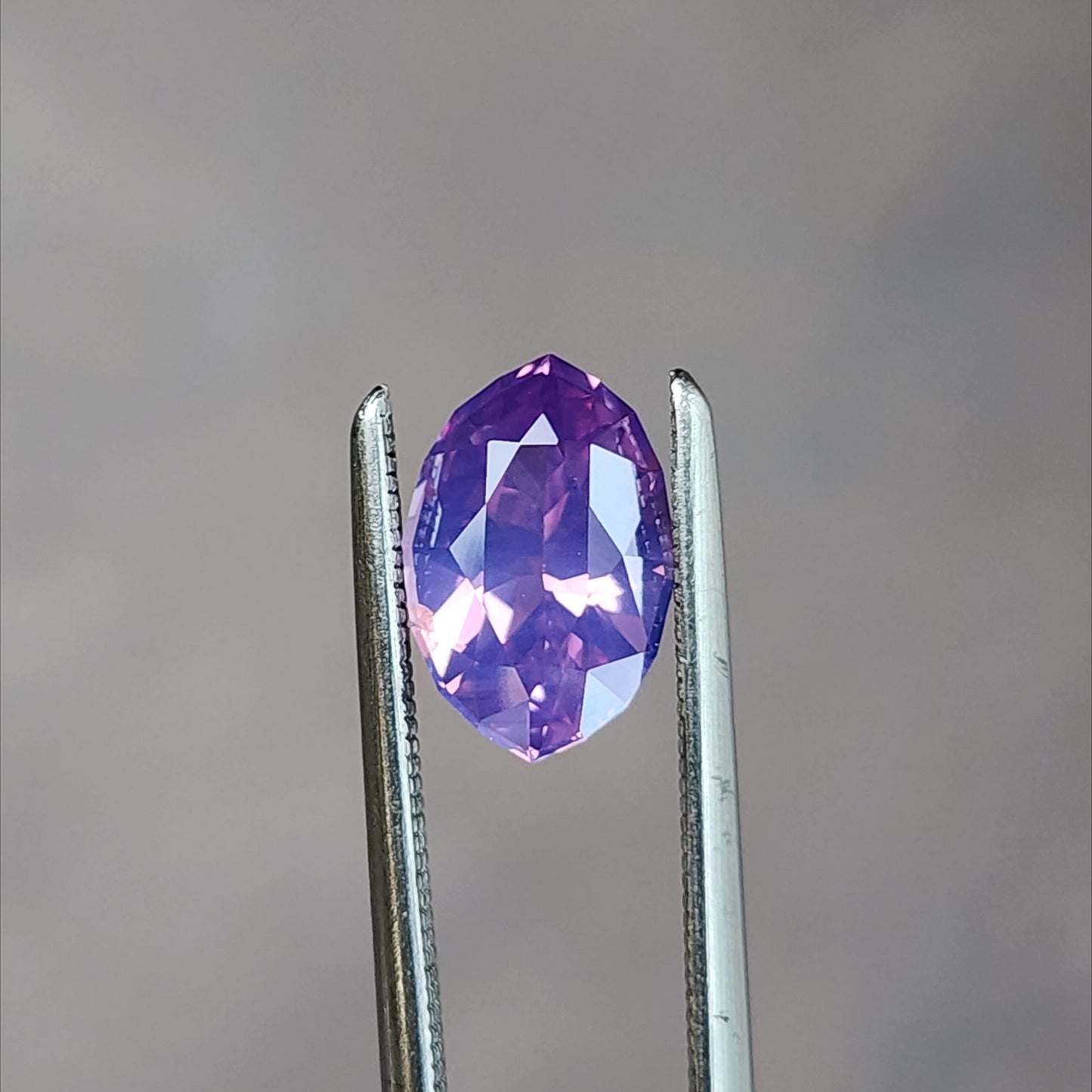 natural purple pink moval sapphire from Sri Lanka