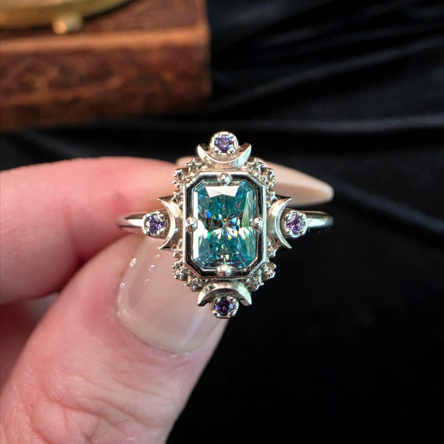 blue green moissanite ring with stars and moons white gold celestial alexandrite image 1