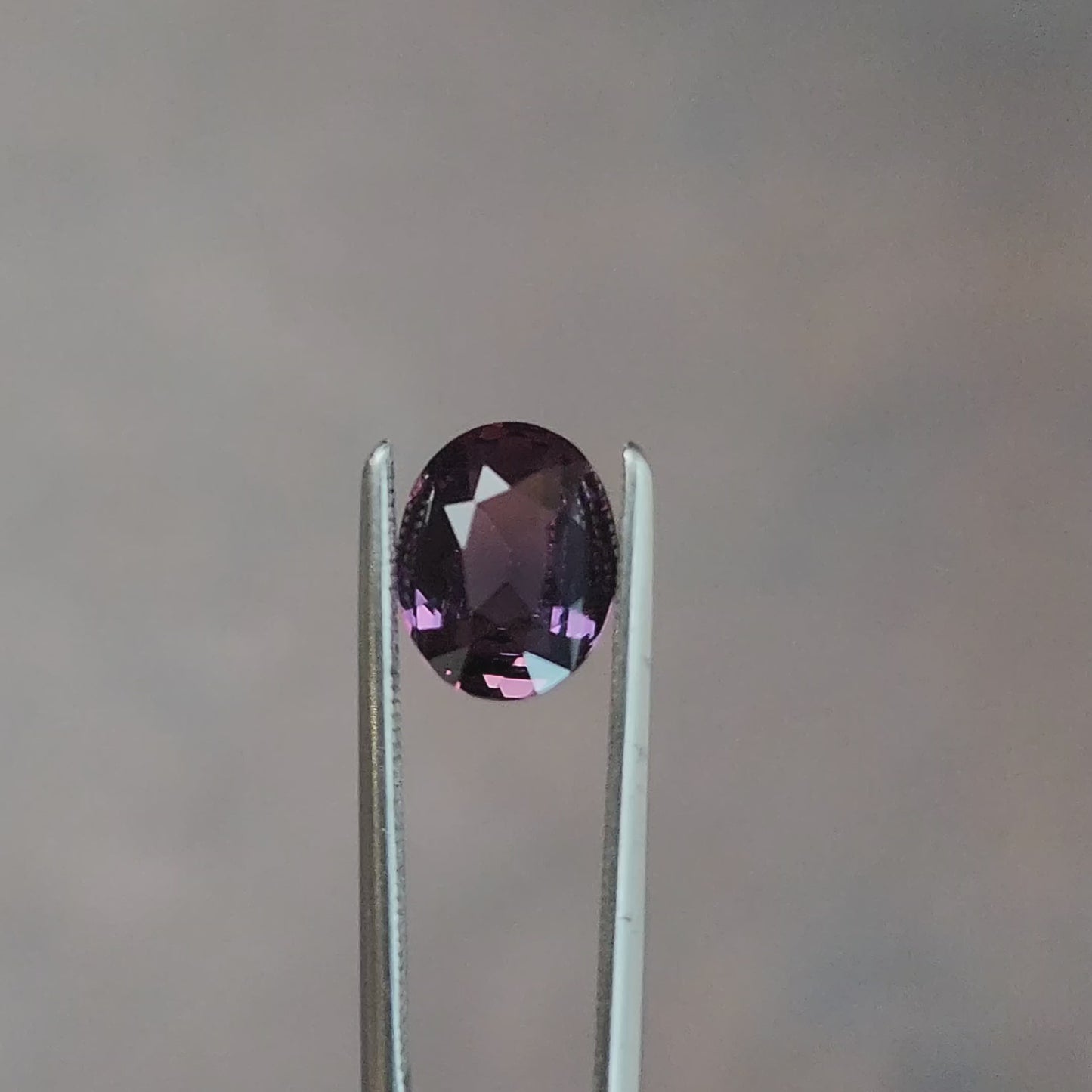 Load and play video in Gallery viewer, natural purple red oval sapphire from Sri Lanka
