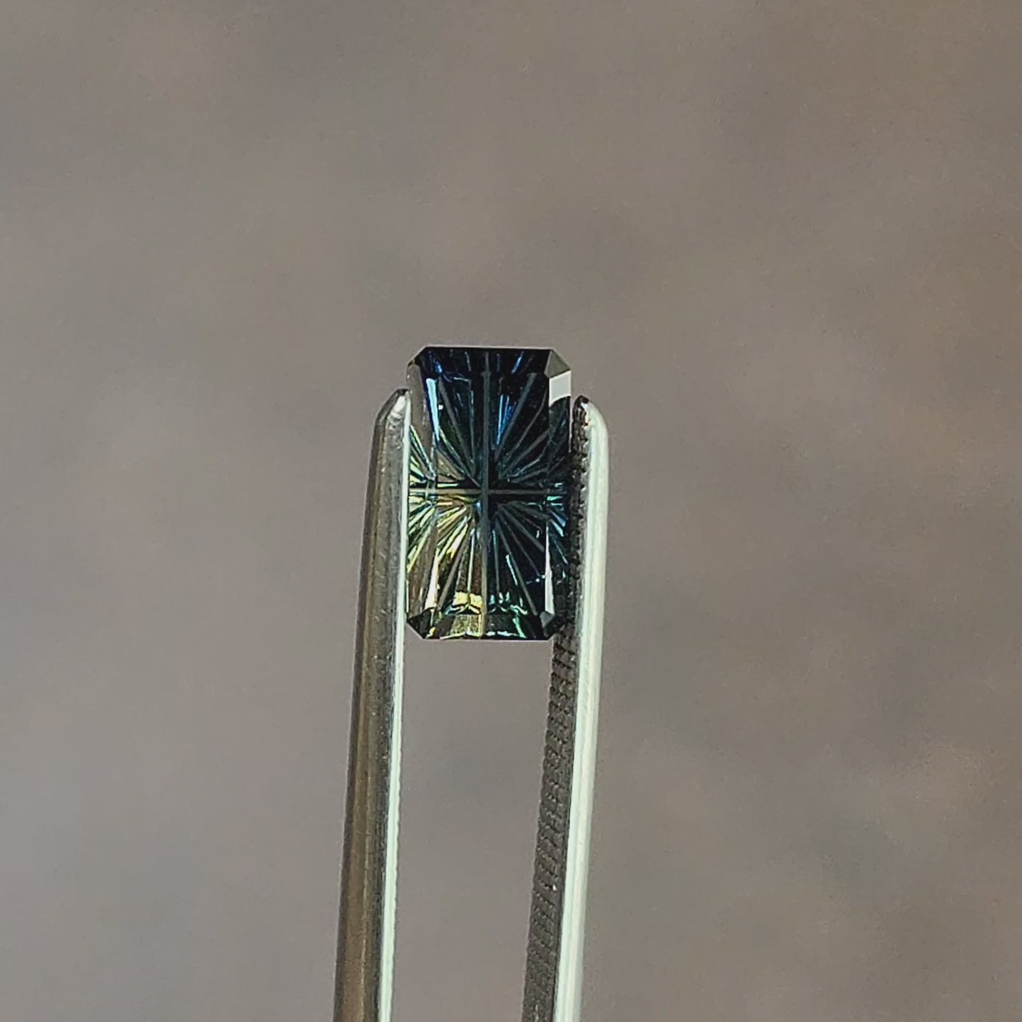 Load and play video in Gallery viewer, 1.08ct Natural Australian Sapphire Elongated Emerald Fantasy Cut
