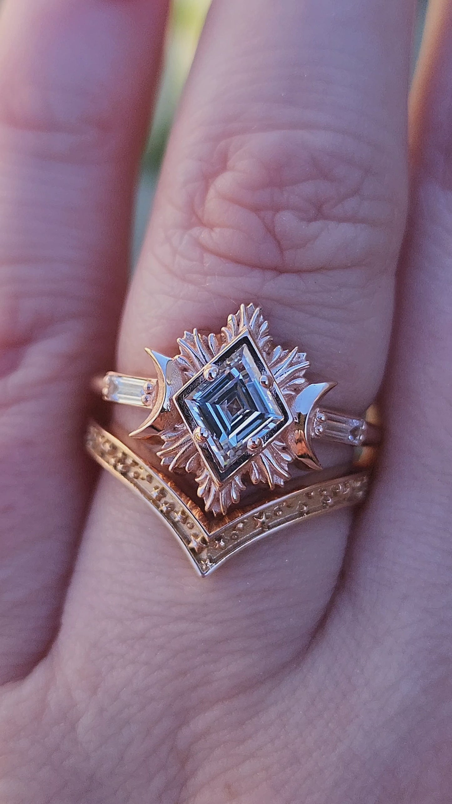 Load and play video in Gallery viewer, Rose gold galactic moon fire ring with a kite diamond in a blue velvet box video
