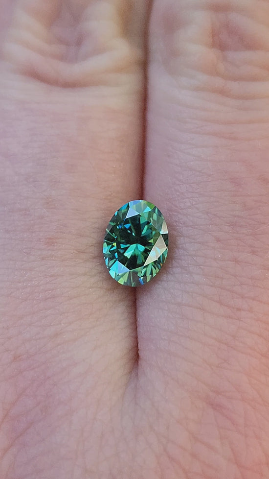 Load and play video in Gallery viewer, 1.34ct Oval Green Moissanite 8x6mm
